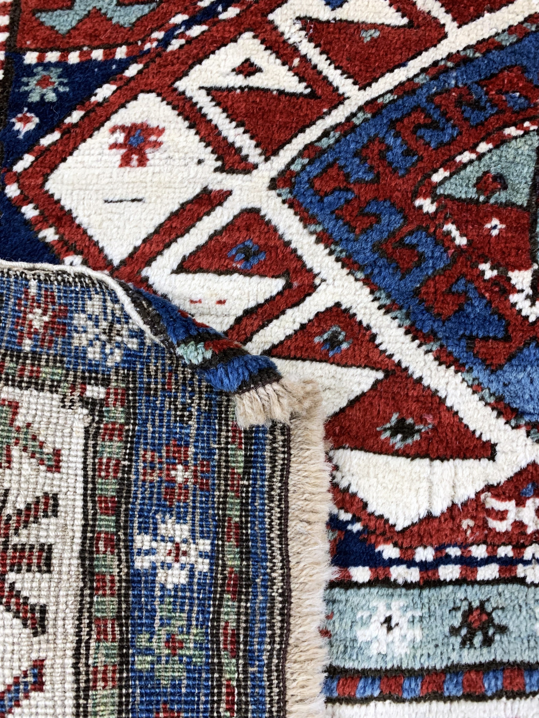 Detail e: Antiker Kazak"Shulaver", Kaukasus, 19.Jhd, Wolle auf Wolle, ca. 290 x 111 cm, EHZ: 3