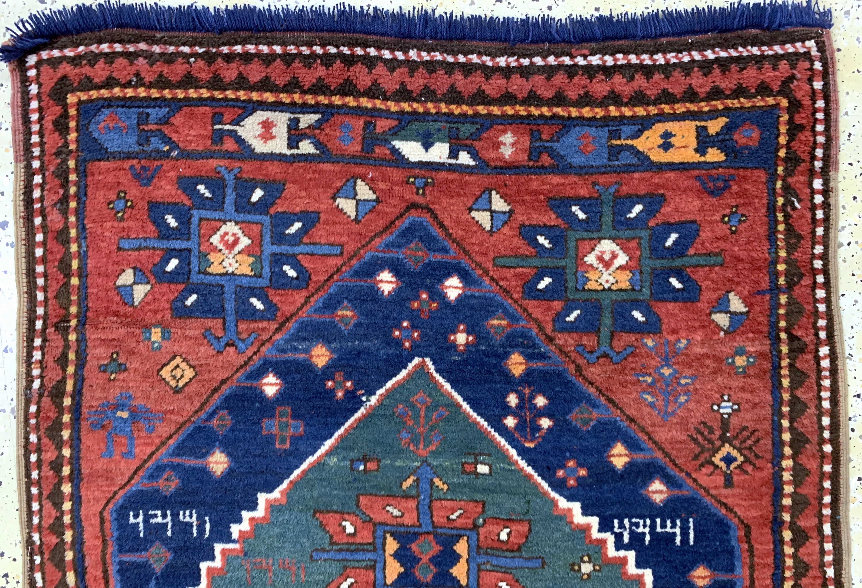 Detail a: Antiker Kazak, Kaukasus, datiert 1334(1914), Wolle auf Wolle, ca. 245 x 116 cm,EHZ: 2