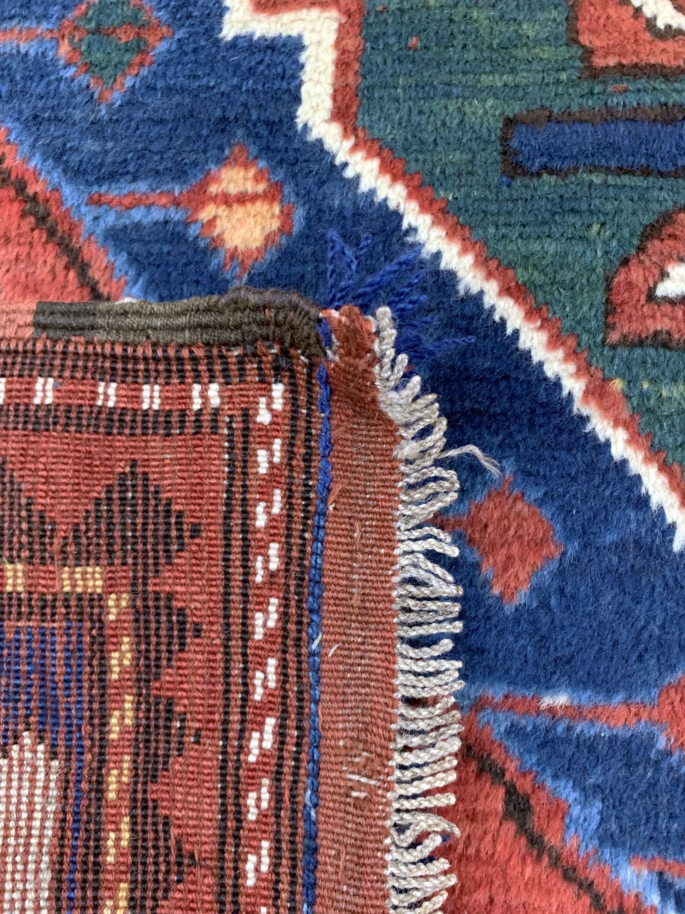 Detail f: Antiker Kazak, Kaukasus, datiert 1334(1914), Wolle auf Wolle, ca. 245 x 116 cm,EHZ: 2