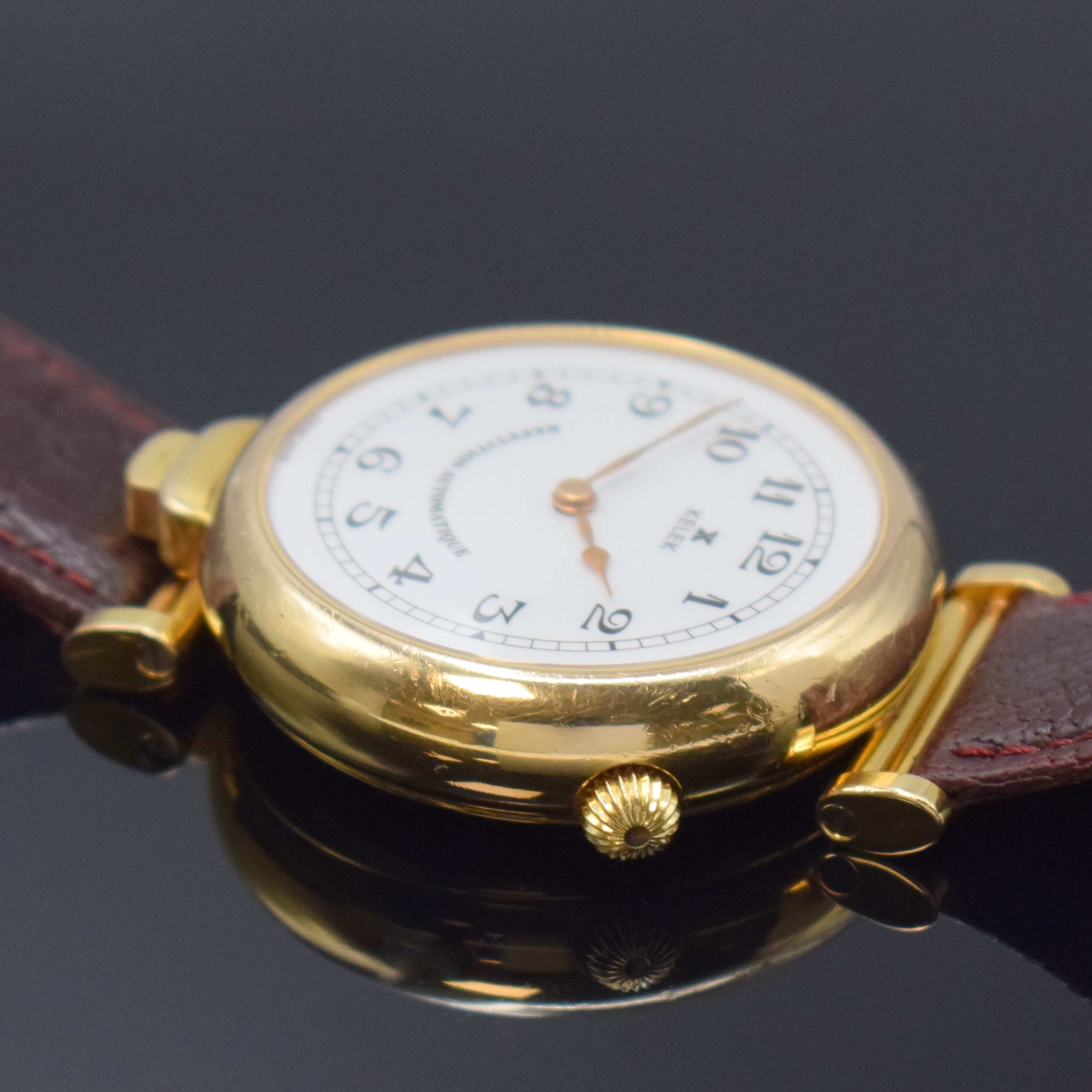 Detail b: KELEK Herrenarmbanduhr mit 5-Minutenrepetition Referenz DK 87-211 A, Schweiz 1990er Jahre, Automatik, verg., beids. vergl. Geh., bewegl. Bandanst., ...