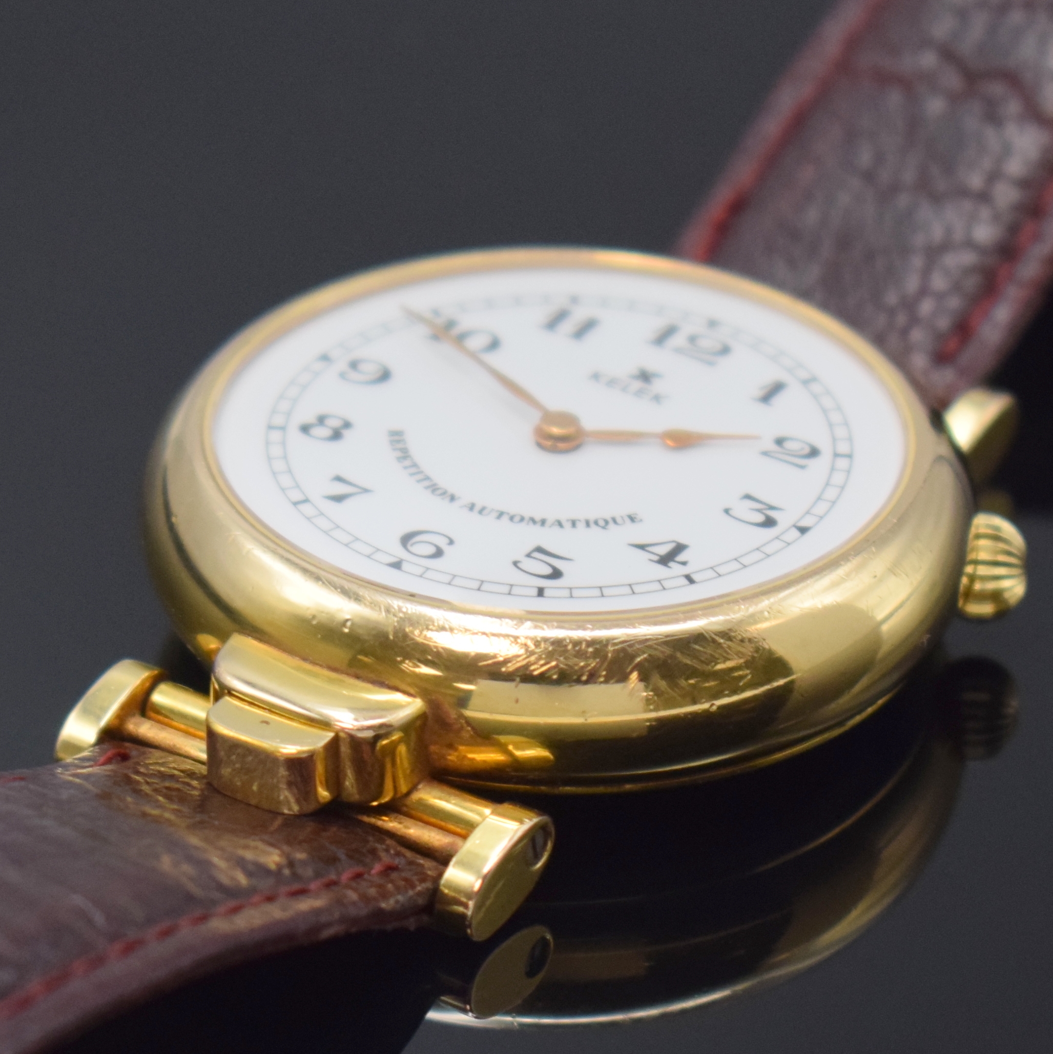 Detail c: KELEK Herrenarmbanduhr mit 5-Minutenrepetition Referenz DK 87-211 A, Schweiz 1990er Jahre, Automatik, verg., beids. vergl. Geh., bewegl. Bandanst., ...