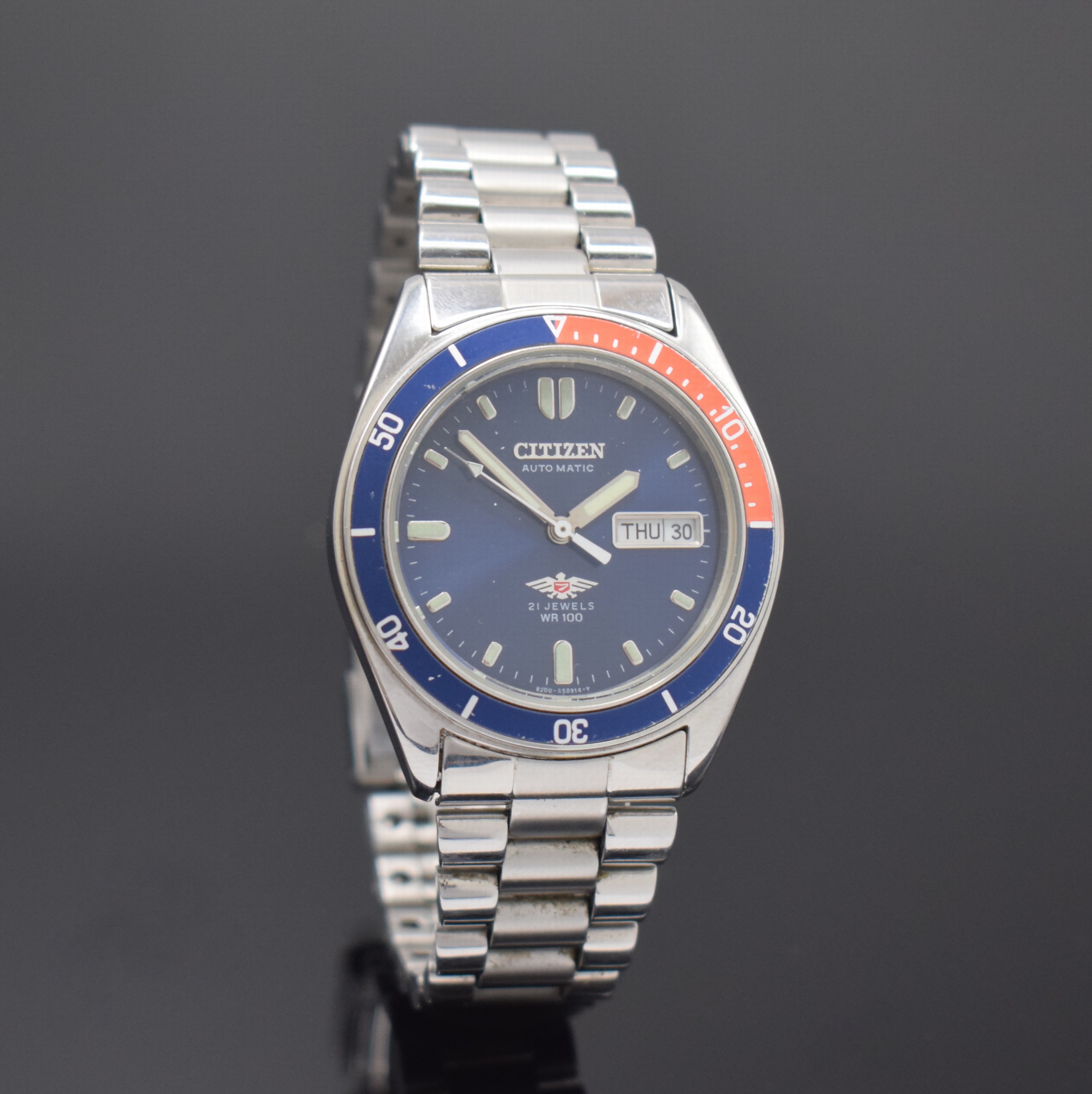 Detail c: CITIZEN Herrenarmbanduhr Eagle 7 Referenz 4-R12021 RW Automatik, Japan um 1978, Edelstahlgeh. inkl. orig. Gliederband m. Faltschl., Boden verschr., ...