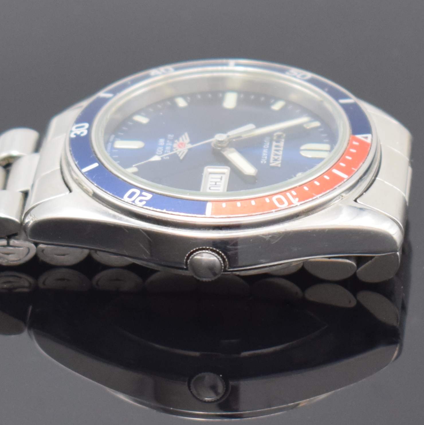 Detail e: CITIZEN Herrenarmbanduhr Eagle 7 Referenz 4-R12021 RW Automatik, Japan um 1978, Edelstahlgeh. inkl. orig. Gliederband m. Faltschl., Boden verschr., ...