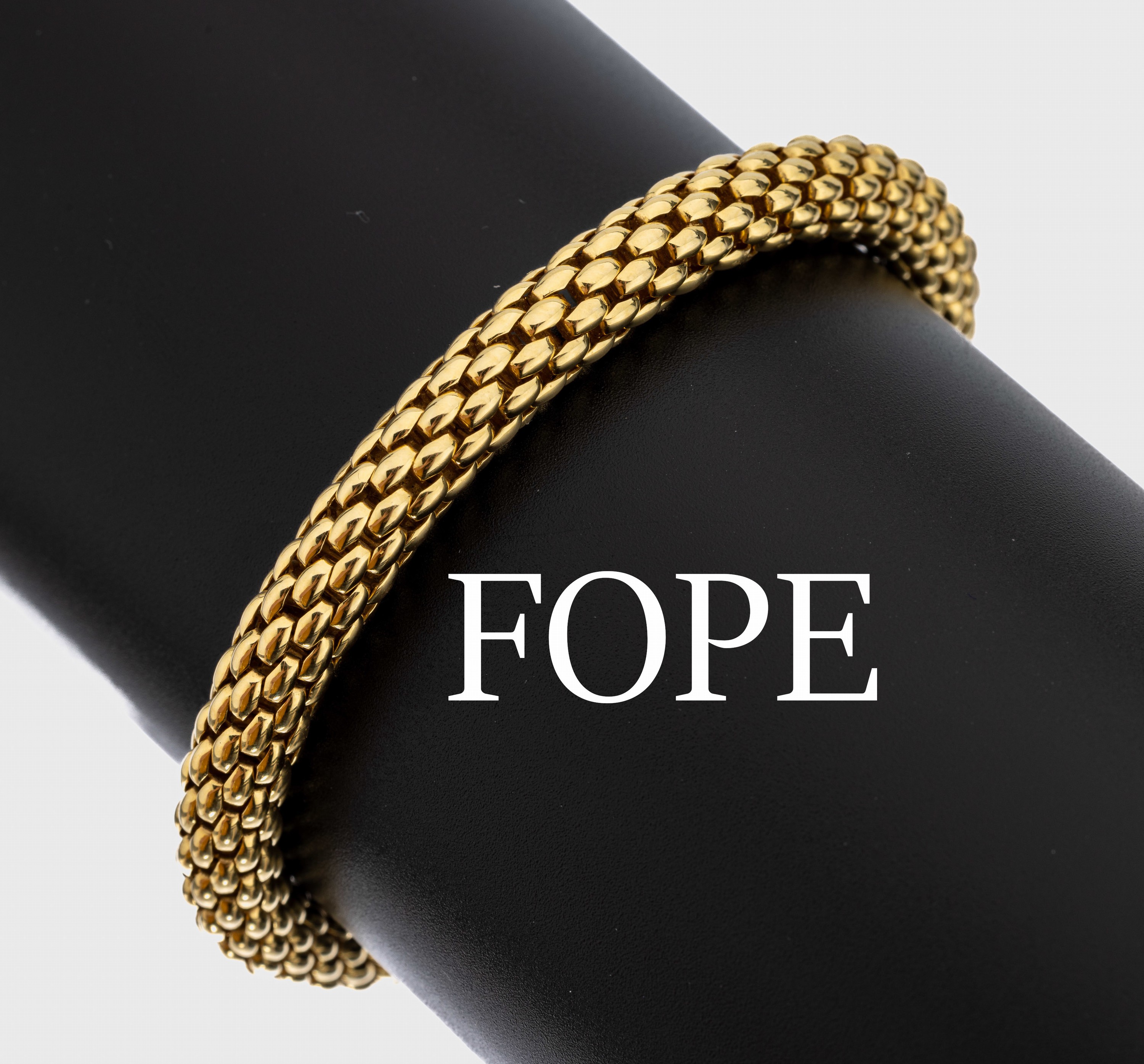 18 kt Gold FOPE Armband, GG 750/000, Serie Flex It, D. ca. 7 mm, L. ca. 19.5 cm, Kastenschloss mit Sicherheitsacht, ca. 27.5 g,sign.