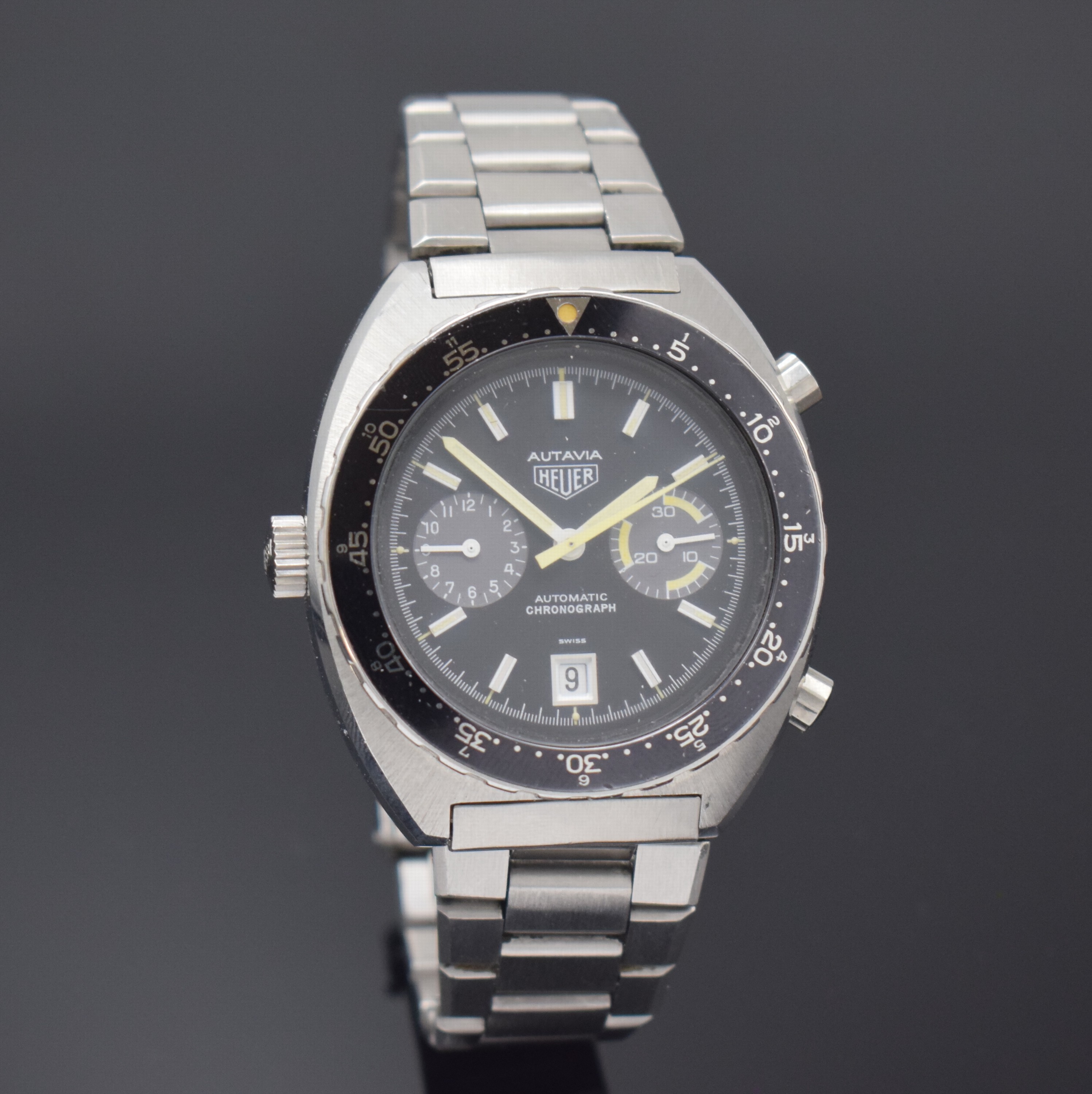 Detail b: HEUER Autavia Armbandchronograph in Stahl/ Stahlband Referenz 11630, Schweiz um 1975, Automatik, verschr. Geh., orig. Krone u. Drücker, beids. ...