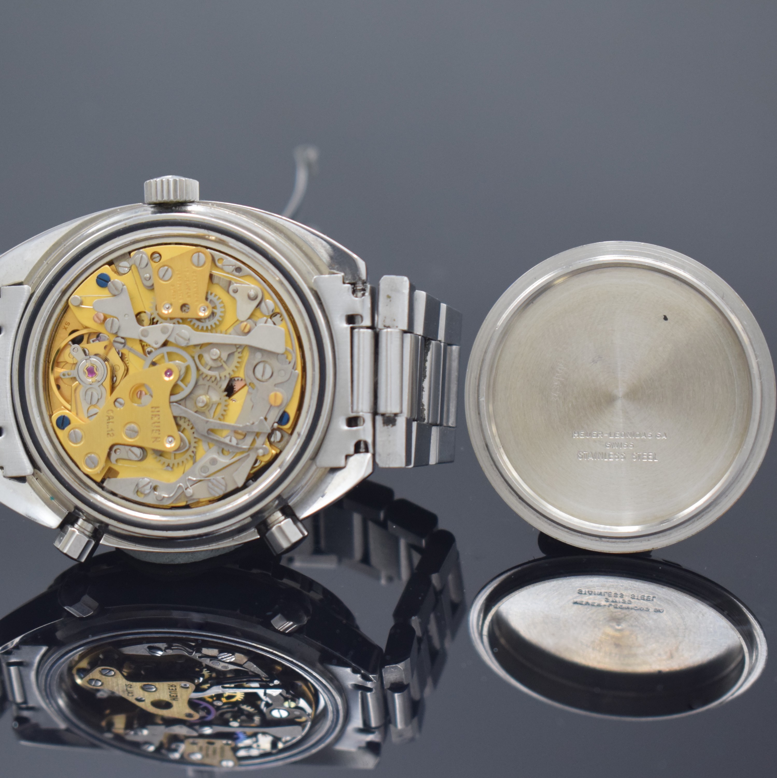 Detail g: HEUER Autavia Armbandchronograph in Stahl/ Stahlband Referenz 11630, Schweiz um 1975, Automatik, verschr. Geh., orig. Krone u. Drücker, beids. ...