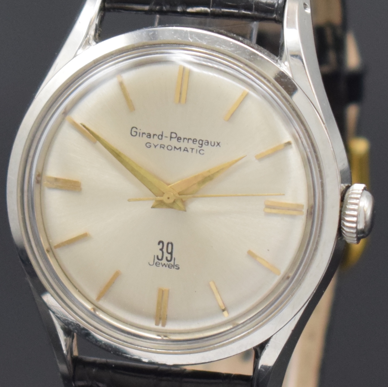 Detail a: GIRARD PERREGAUX Gyromtic Armbanduhr in Stahl, Schweiz um 1960, Automatik, 2-tlg. Geh., Boden verschr., silb. Zifferbl., gold. Indizes u. Zeiger, ...
