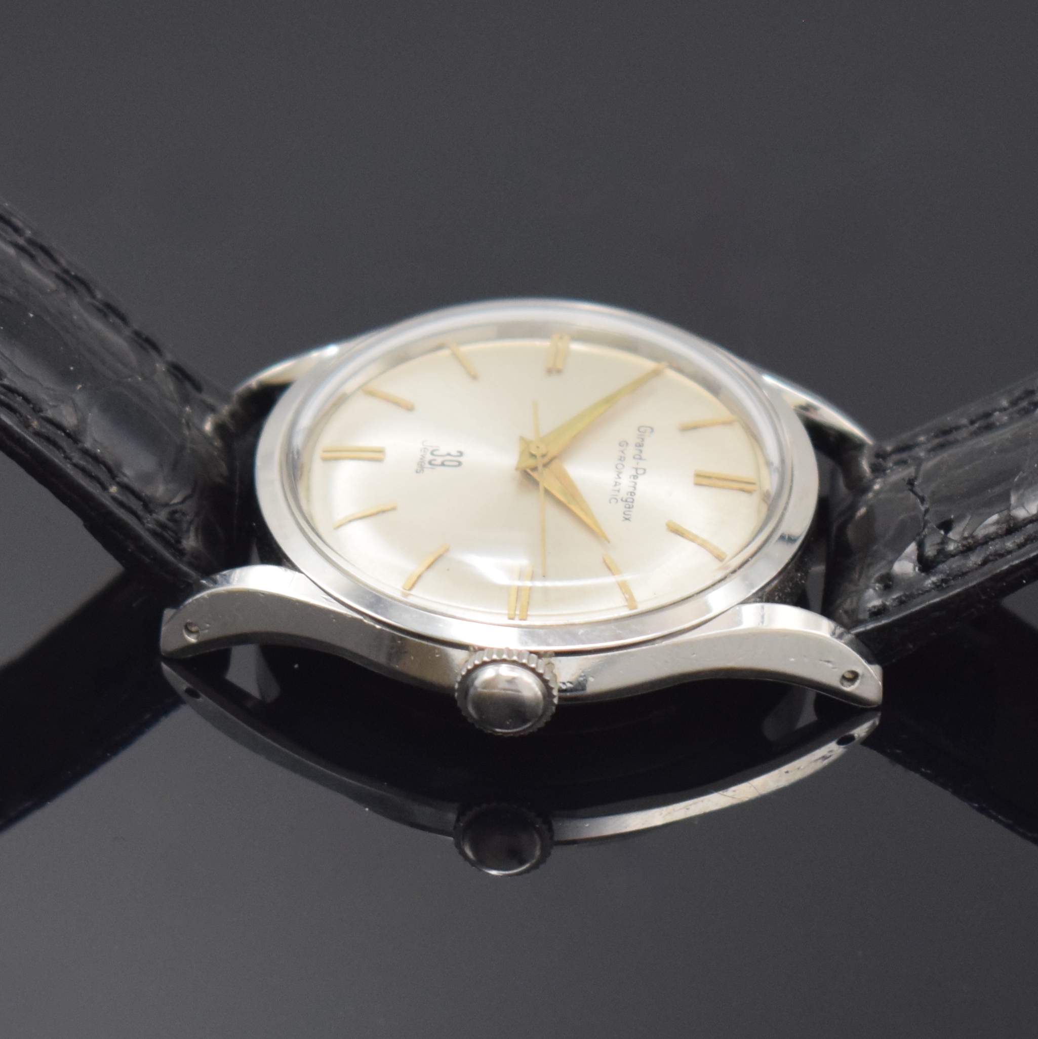 Detail e: GIRARD PERREGAUX Gyromtic Armbanduhr in Stahl, Schweiz um 1960, Automatik, 2-tlg. Geh., Boden verschr., silb. Zifferbl., gold. Indizes u. Zeiger, ...