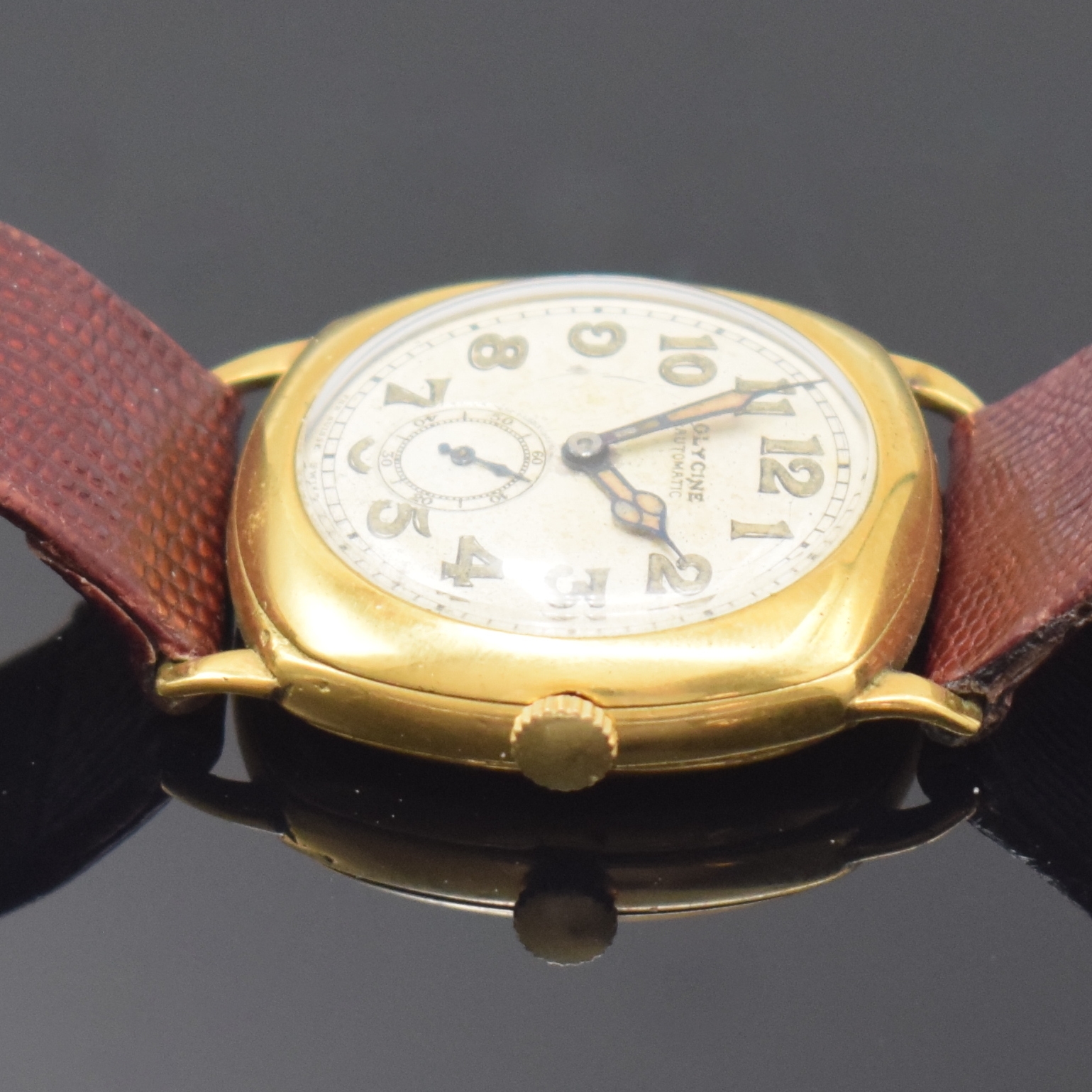 Detail e: GLYCINE seltene frühe Automatik-Armbanduhr, Schweiz um 1935, kissenförm. Geh. verg., Boden u. Glasrand gedr., silb. Zifferbl. fl., arab. ...