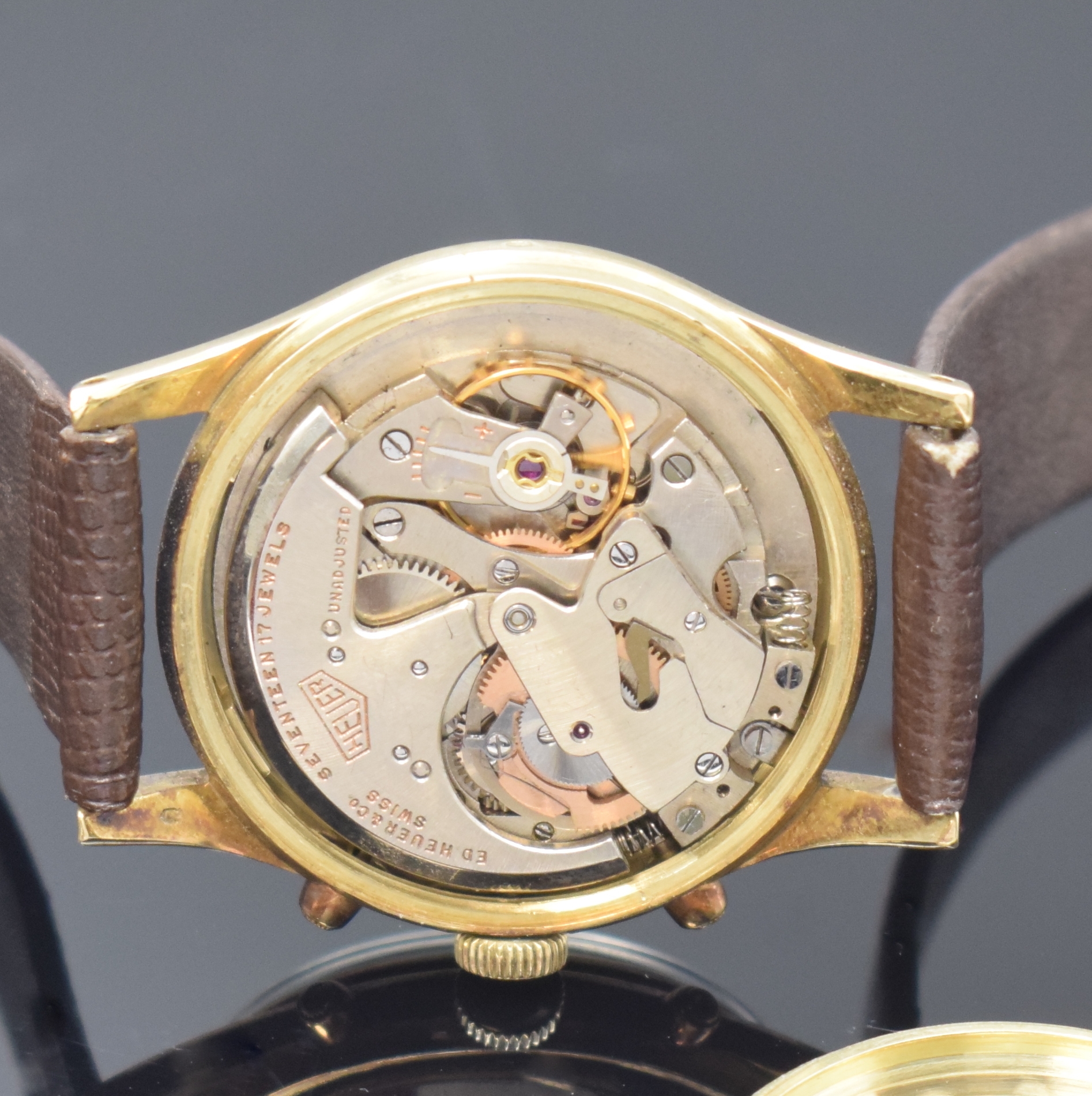 Detail e: HEUER Automatic seltene Armbanduhr mit Vollkalender in GG 585/000, Schweiz um 1950, Hammerautomatik, 2-tlg. Geh., Boden verschr.,seitl. Korrekturdr. ...