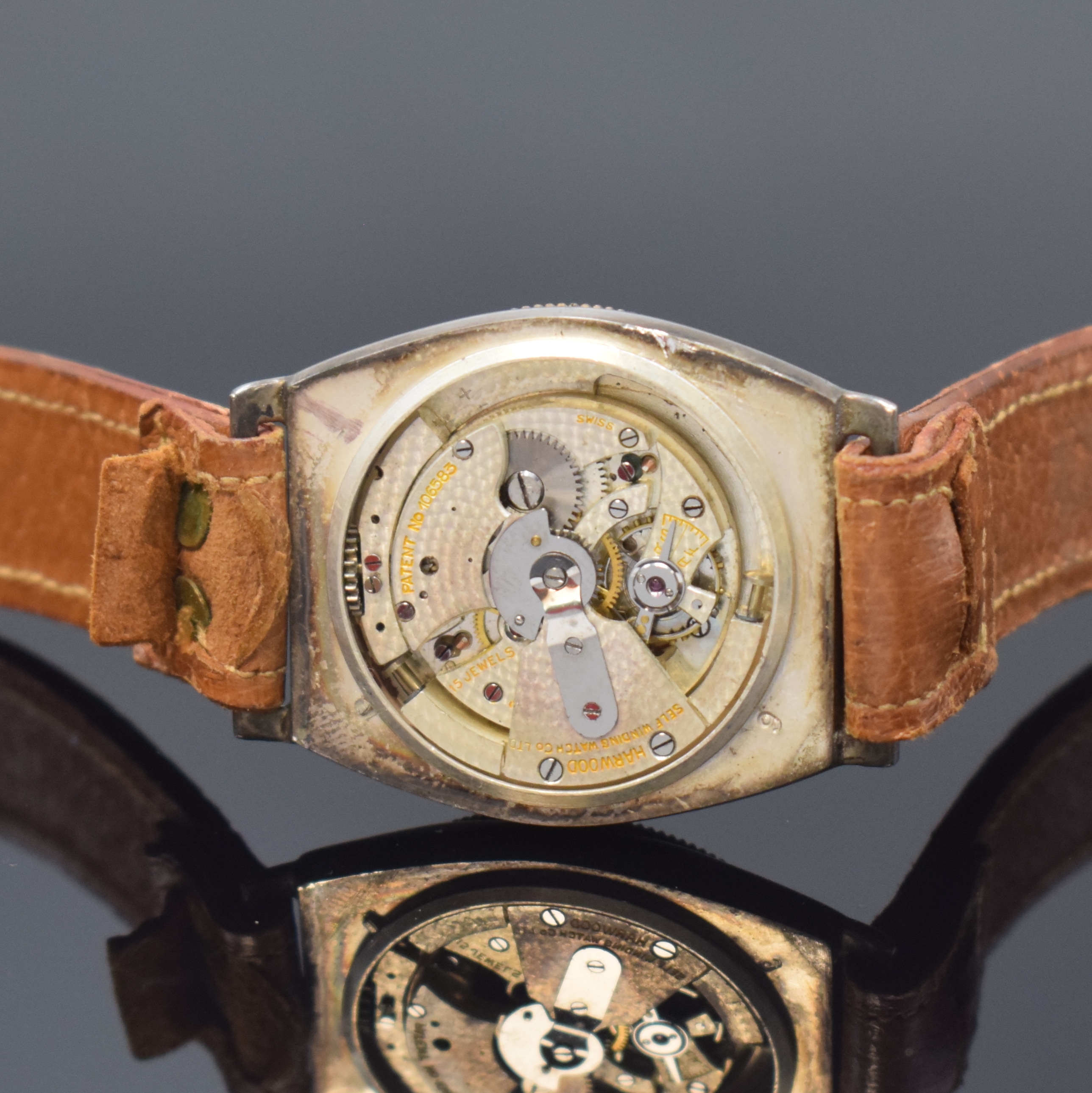 Detail f: HARWOOD frühe Automatik-Armbanduhr in Silber, Schweiz um 1930, Hammerautomatik, Tonneau- förm. Geh., Boden aufgedr., Riffel-Lünette zur ...