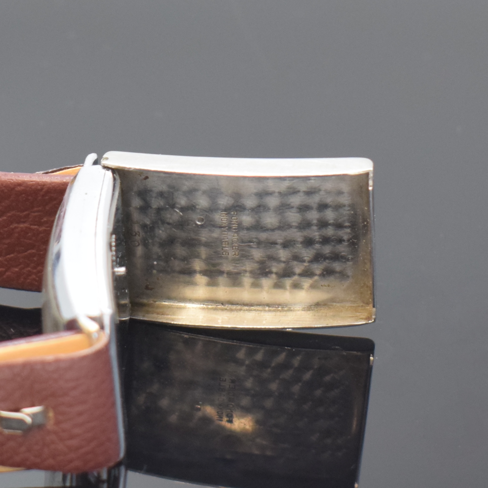 Detail c: WYLER frühe rechteckige Automatikuhr, Schweiz um 1930, verchr. Geh., Boden aufgedr., 2. beweglicher Boden für den Aufzug in Stahl, rücks. Krone f. ...
