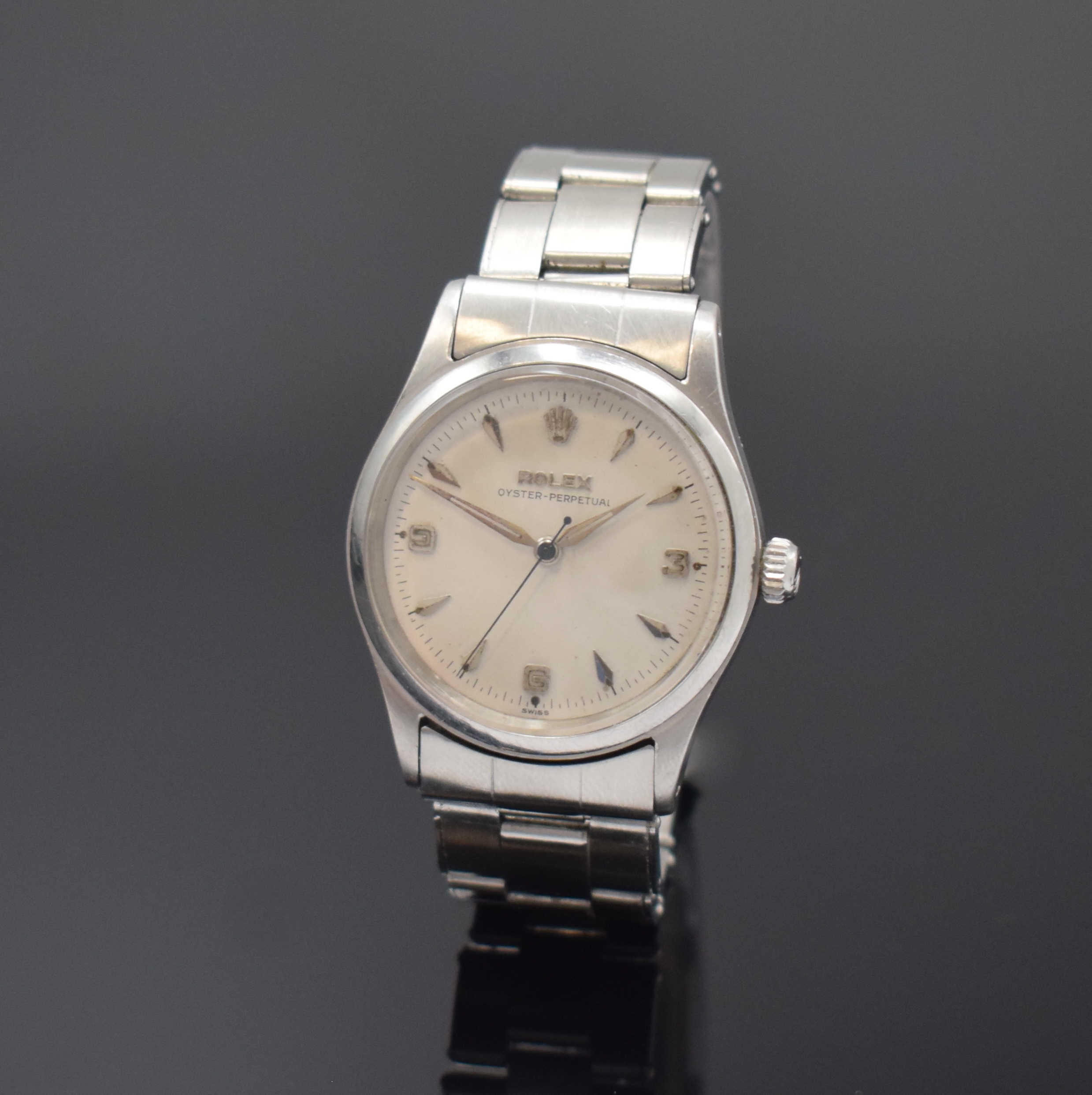 ROLEX Oyster Perpetual Armbanduhr Referenz 6532 in Stahl, Schweiz um 1956, Automatik, verschr. Oystergeh., glatte Lünette, Oyster- Nietenband v. ...