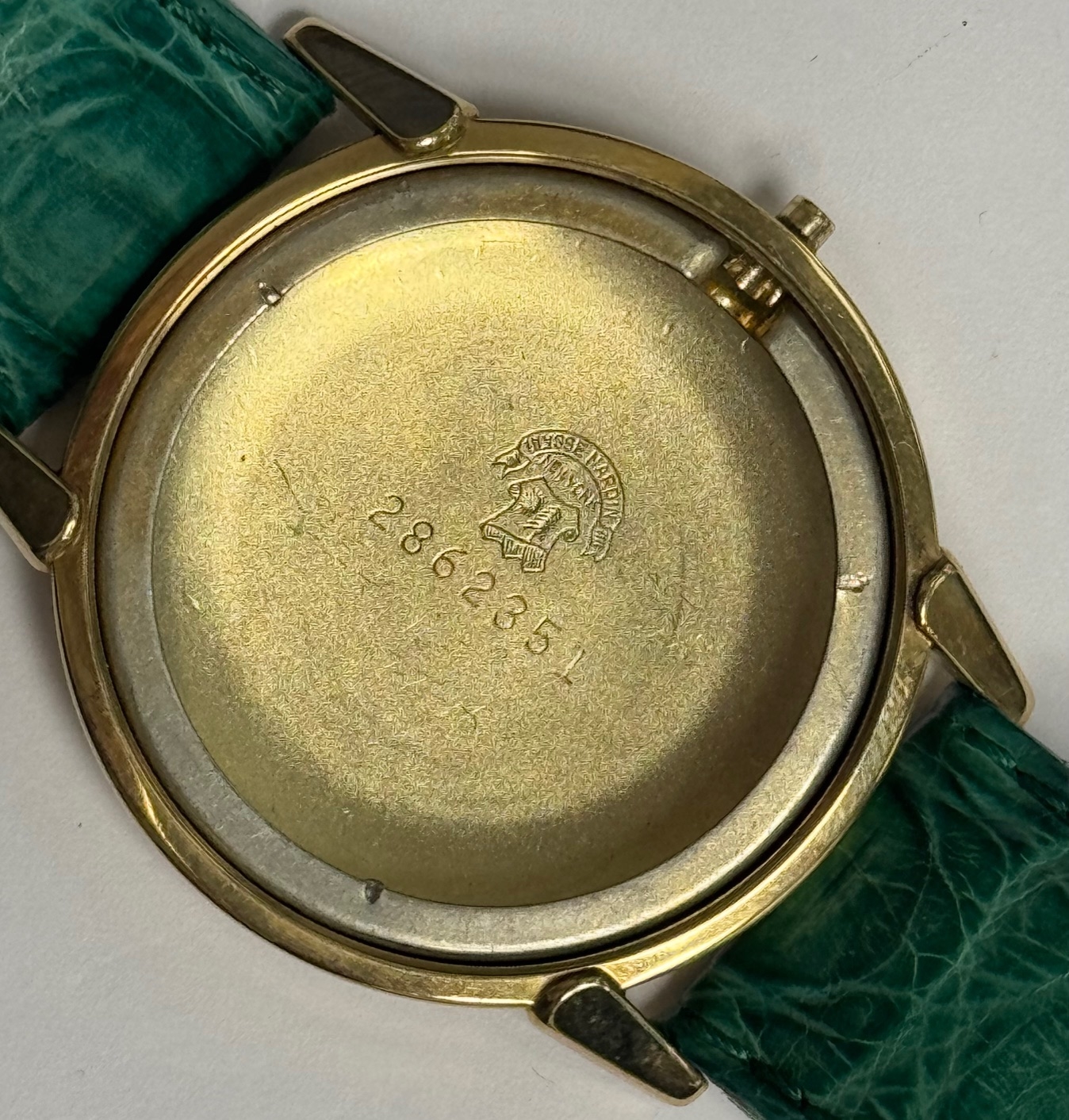 Detail d: ULYSSE NARDIN Chronometer Armbanduhr in GG 585/000, Schweiz/USA um 1965, Automatik, amerikanisches Monocoque Geh., silb. Schraffur-Zifferbl. pat., ...