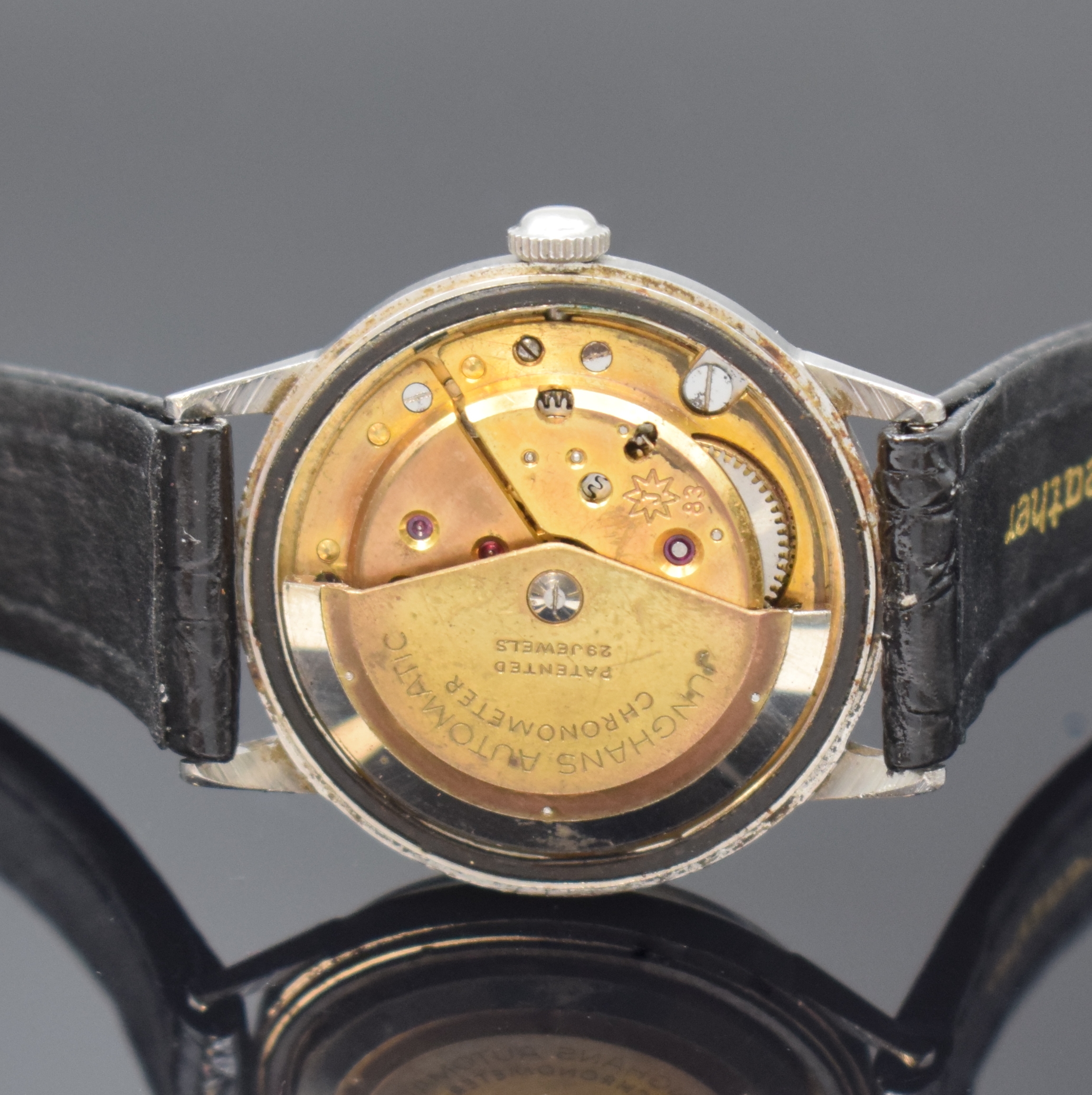Detail d: JUNGHANS Automatik-Chronometer Kaliber 83 in Stahl, Deutschland um 1960, 2-tlg. Geh., Boden aufgedr., Glasrand zu ers., silb. Zifferbl. pat., gold. ...