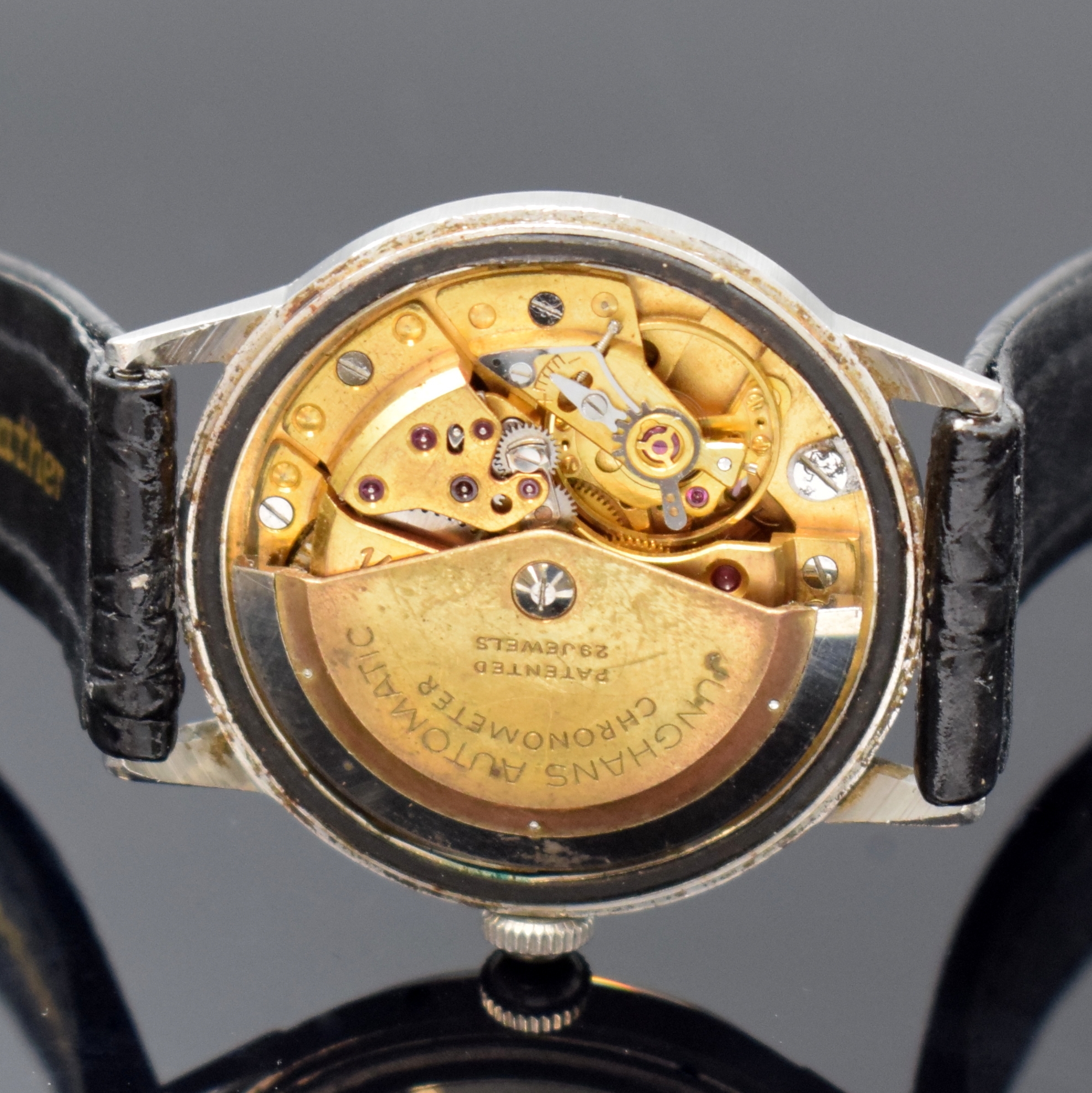 Detail e: JUNGHANS Automatik-Chronometer Kaliber 83 in Stahl, Deutschland um 1960, 2-tlg. Geh., Boden aufgedr., Glasrand zu ers., silb. Zifferbl. pat., gold. ...