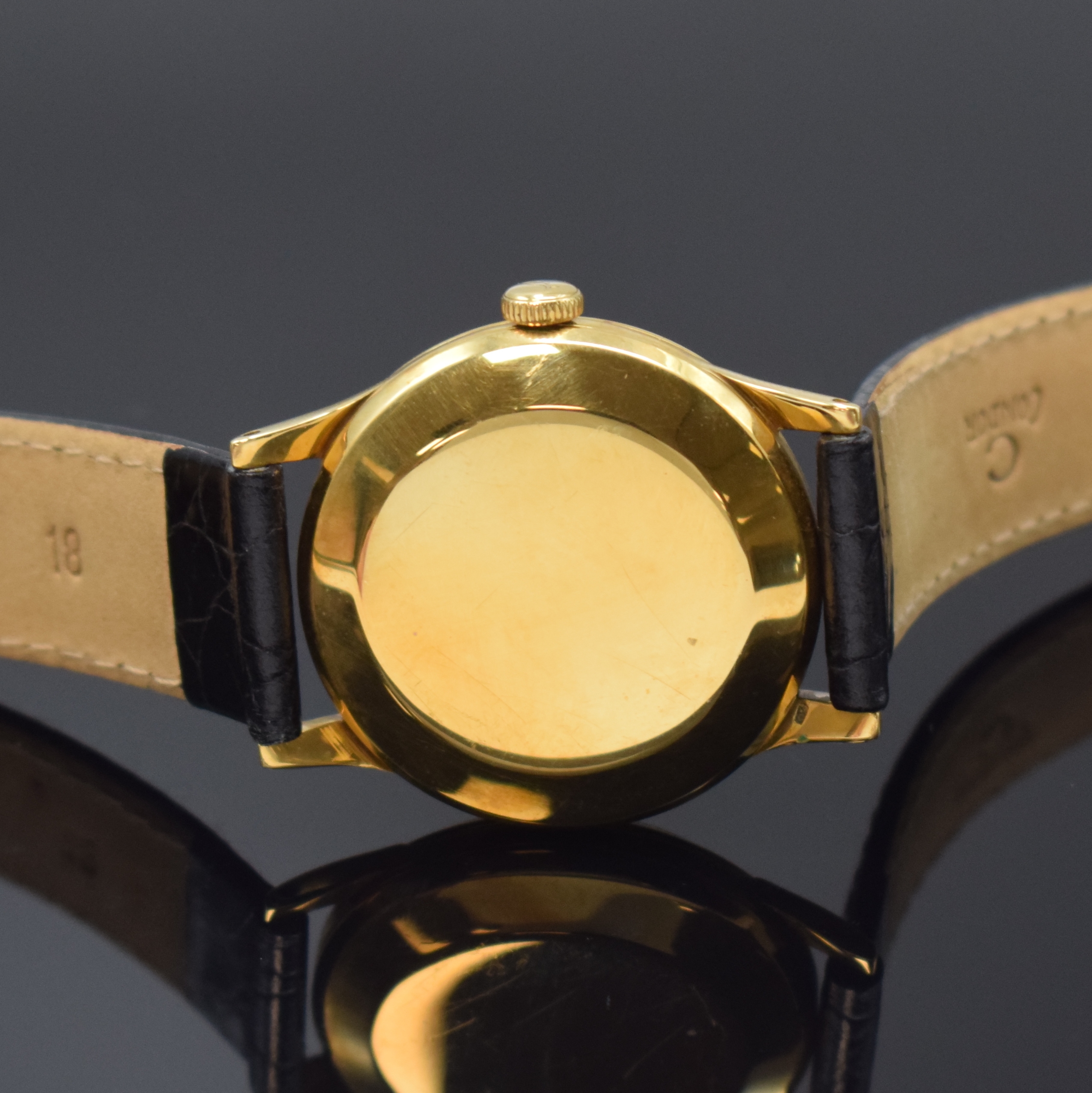 Detail c: IWC Armbanduhr in GG 750/000, Schweiz um 1953, Automatik, 3-tlg. Geh., Boden u. Glasrand aufgedr., orig. Krone, silb. Zifferbl. rest., gold. ...
