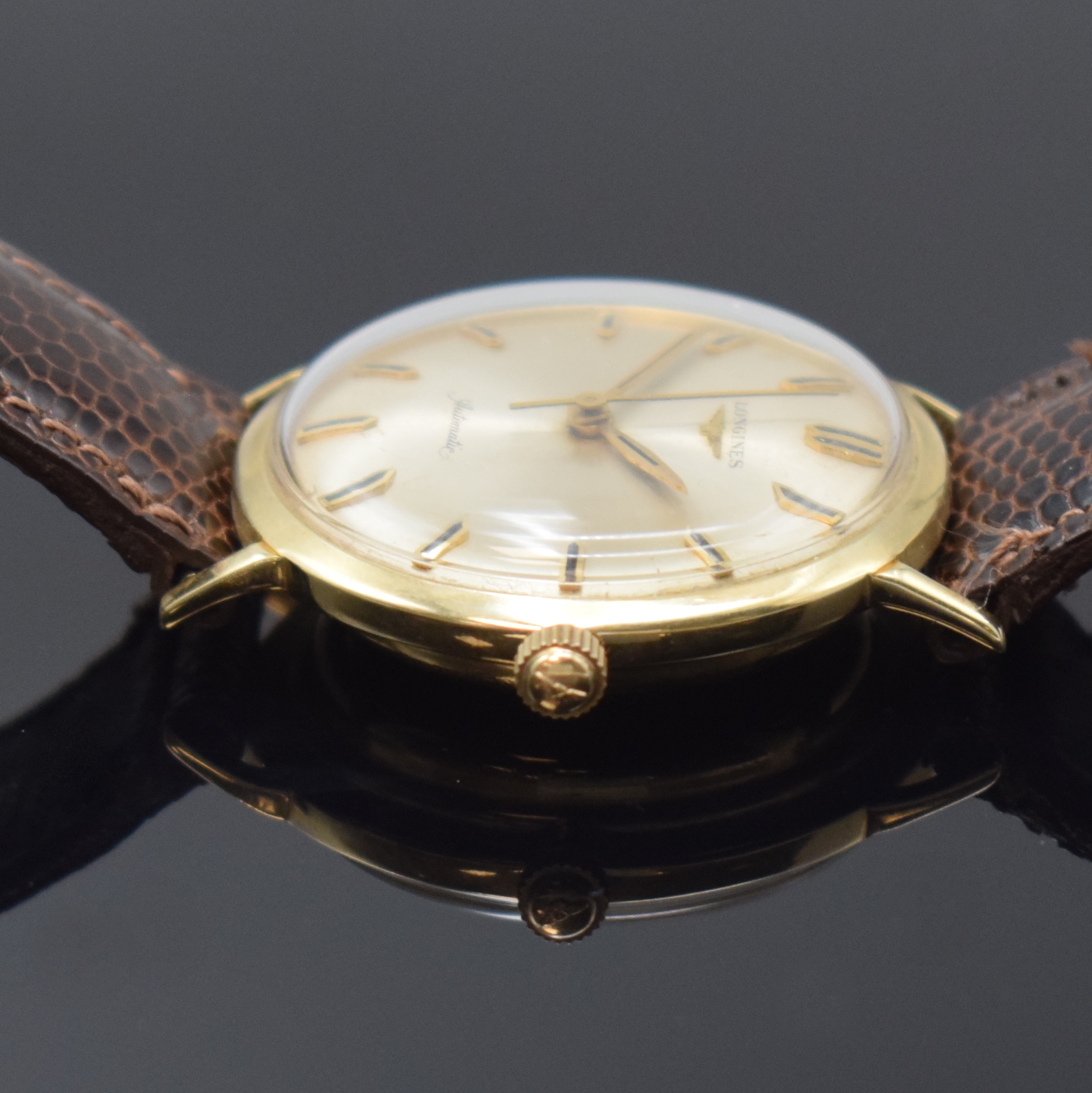 Detail b: LONGINES Armbanduhr in GG 585/000, Schweiz / USA um 1960, Automatik, amerikanisches Monocogue-Geh., silb. orig. Zifferbl. m. aufgel. Indizes ...