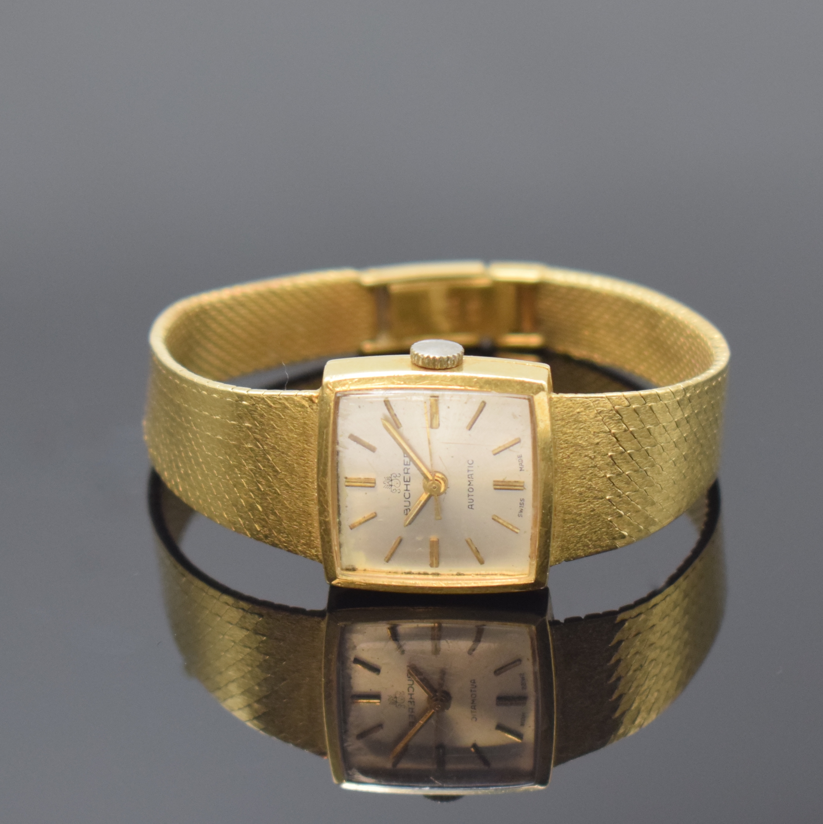 BUCHERER Damenarmbanduhr in GG 750/000 Referenz 1004, Automatik, Schweiz um 1970, 2-teil. Geh., Boden aufgedr., Milanaiseband, silb. Zifferbl. m. ...