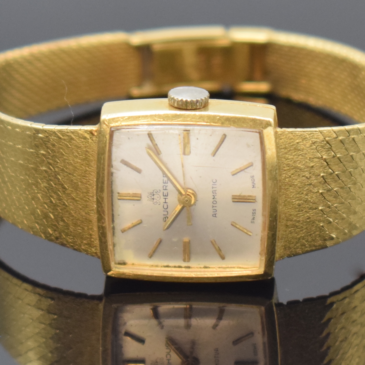 Detail a: BUCHERER Damenarmbanduhr in GG 750/000 Referenz 1004, Automatik, Schweiz um 1970, 2-teil. Geh., Boden aufgedr., Milanaiseband, silb. Zifferbl. m. ...