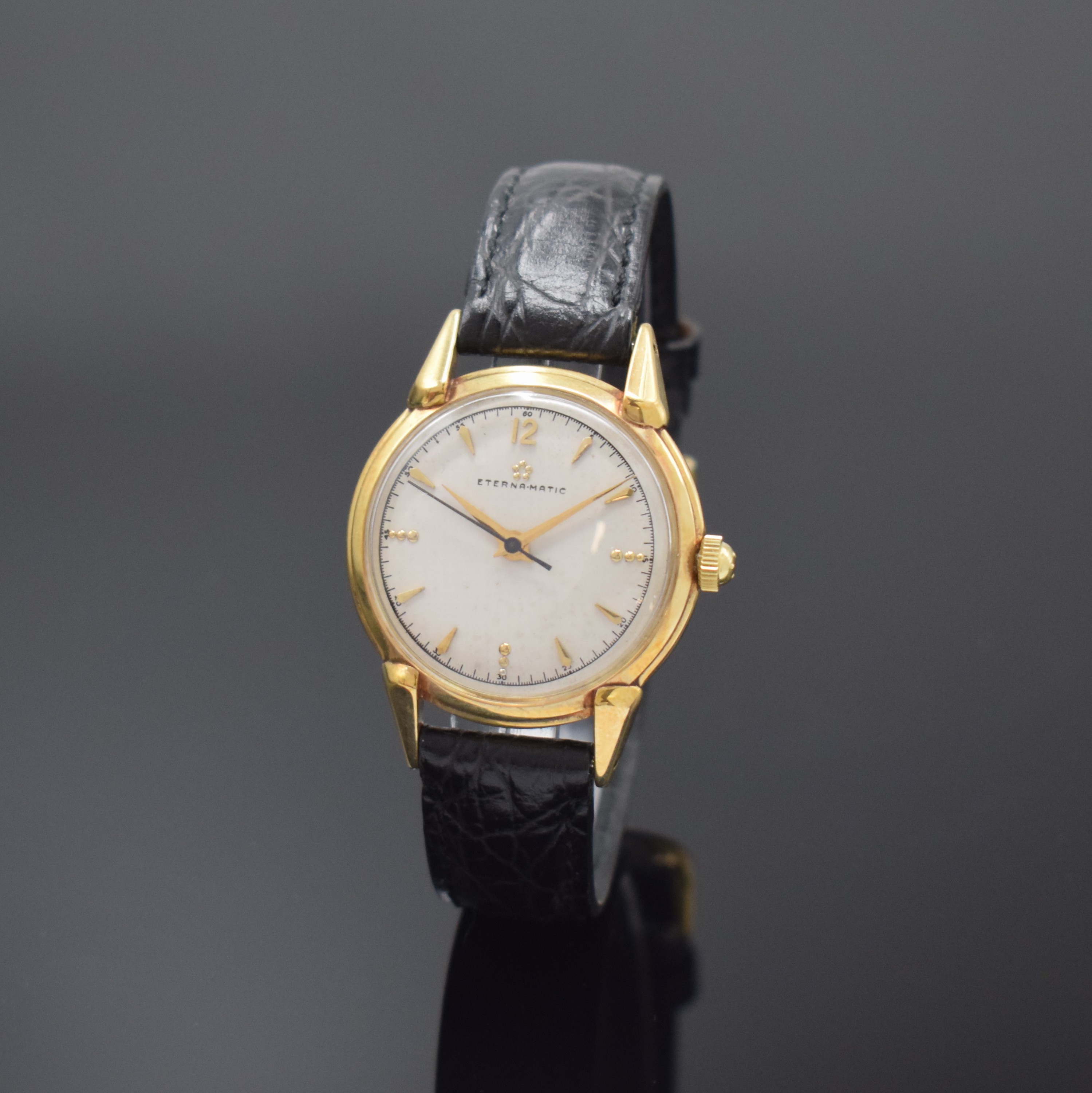 ETERNA-MATIC Armbanduhr in GG 585/000, Automatik, Schweiz um 1955, verschr. Boden mit graviertem Monogram JJM, Zifferblatt m. aufgel. Indizes rest., ...