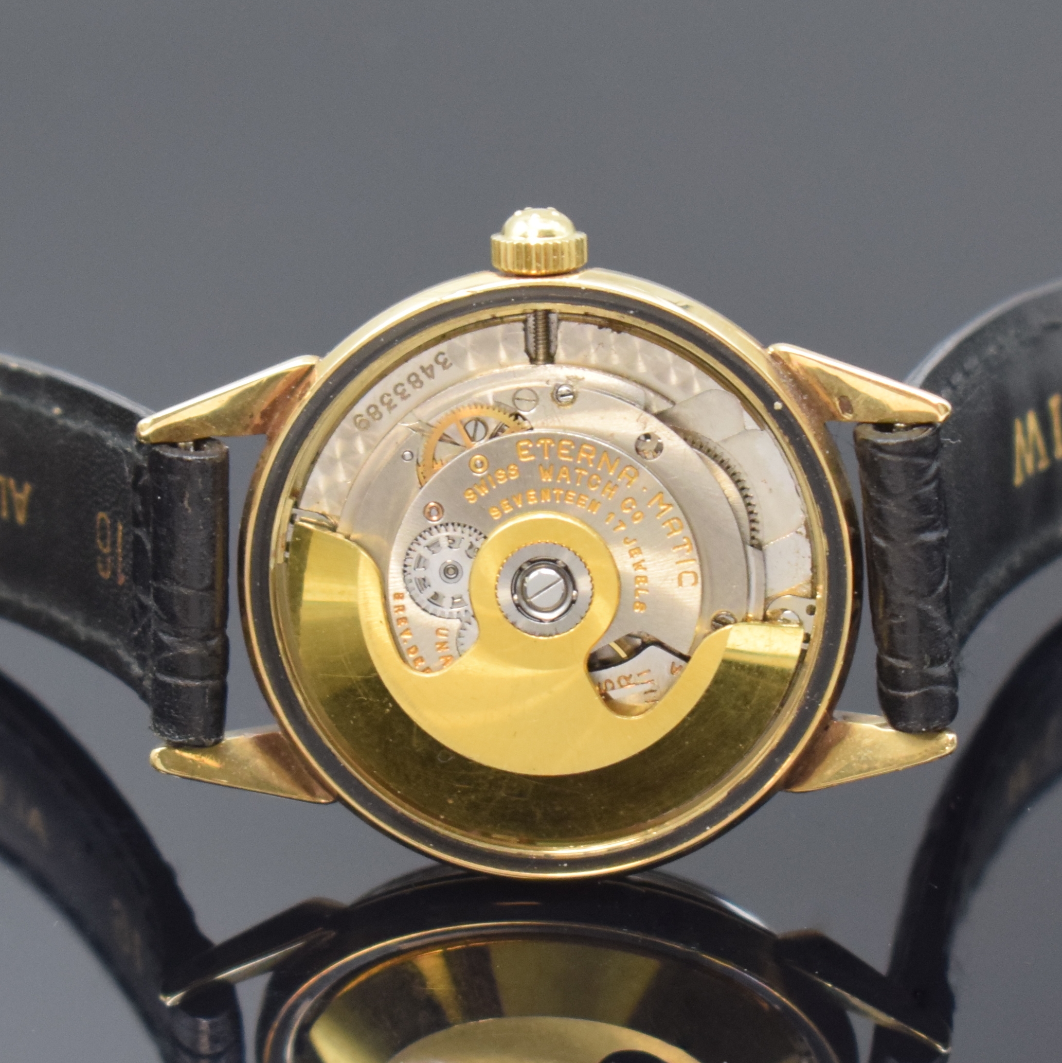 Detail d: ETERNA-MATIC Armbanduhr in GG 585/000, Automatik, Schweiz um 1955, verschr. Boden mit graviertem Monogram JJM, Zifferblatt m. aufgel. Indizes rest., ...