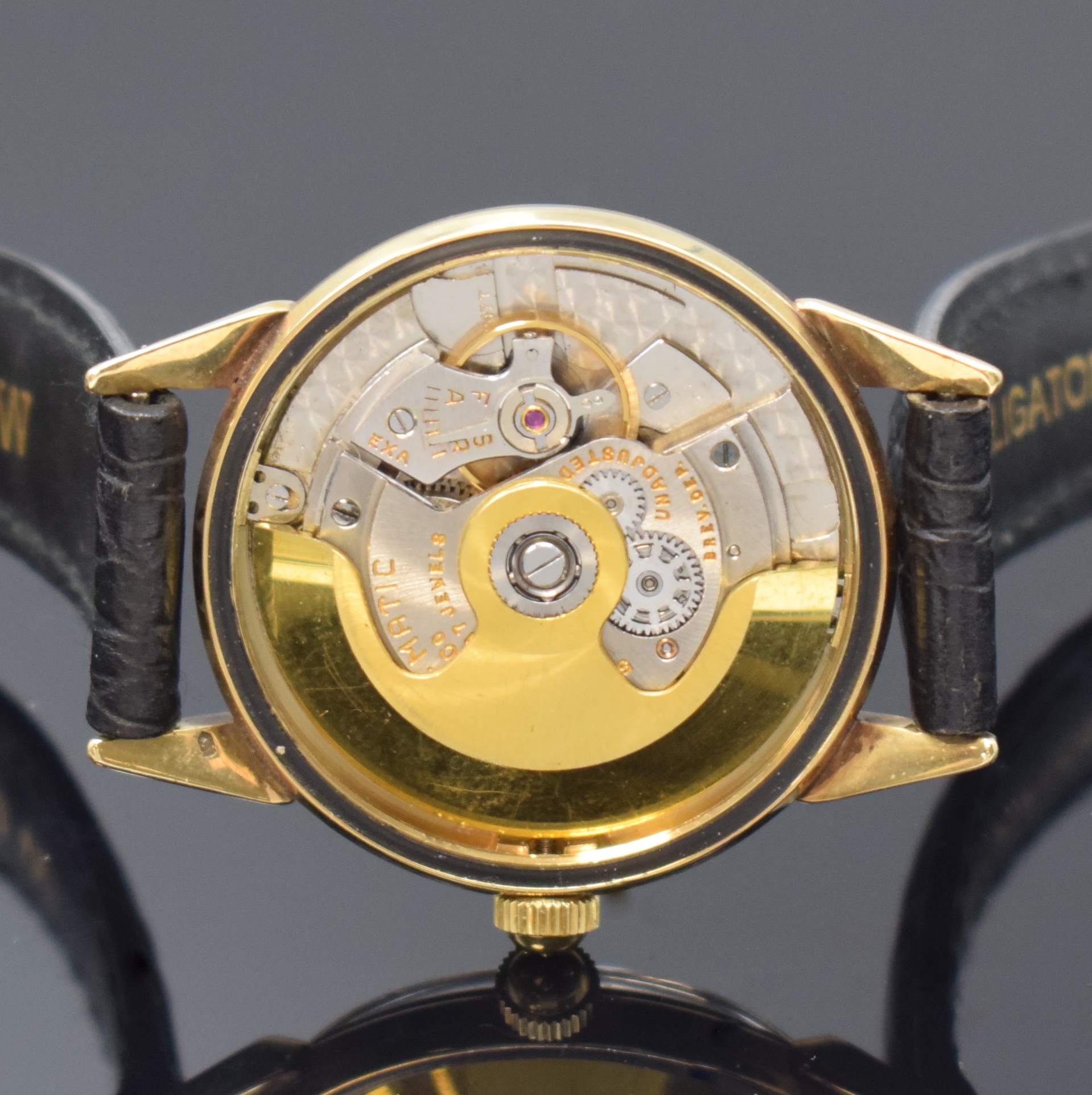 Detail e: ETERNA-MATIC Armbanduhr in GG 585/000, Automatik, Schweiz um 1955, verschr. Boden mit graviertem Monogram JJM, Zifferblatt m. aufgel. Indizes rest., ...