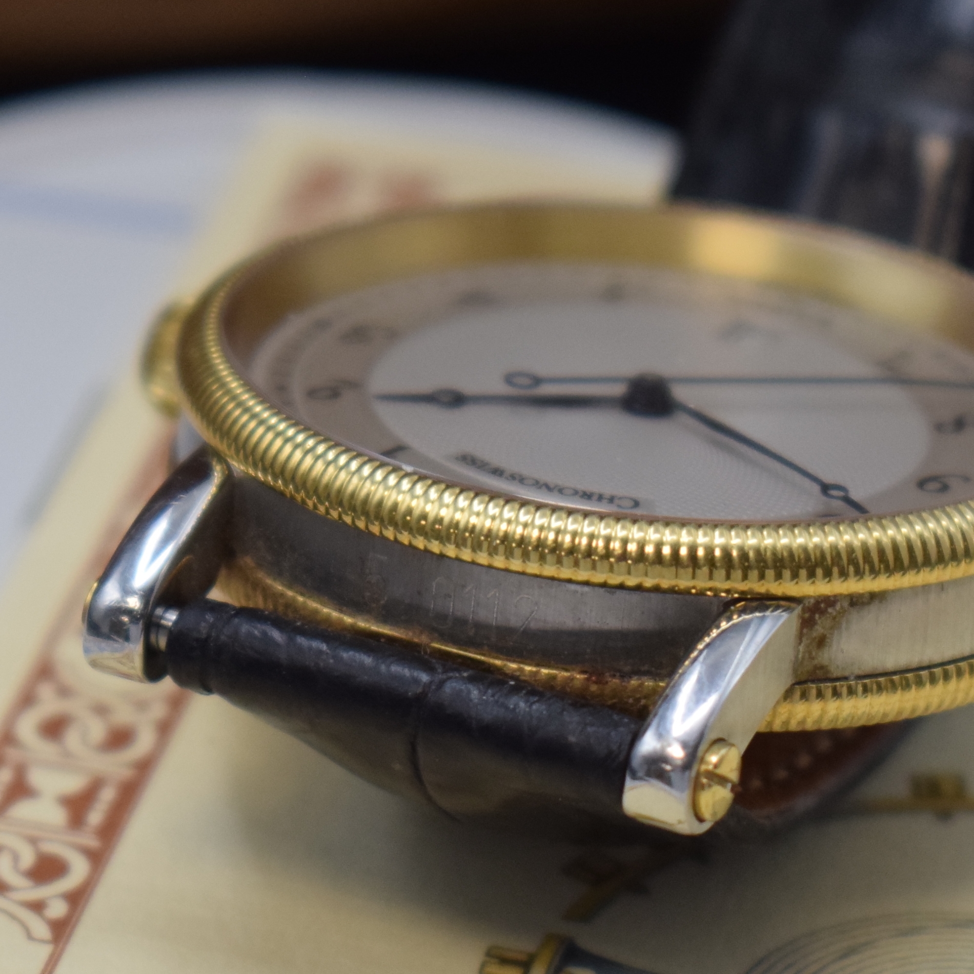 Detail d: CHRONOSWISS Herrenarmbanduhr Kairos in Edelstahl/Gold Referenz CH 2822, Schweiz um 2000, Automatik, beids. vergl. Gehäuse, Boden geschr., silb., im ...