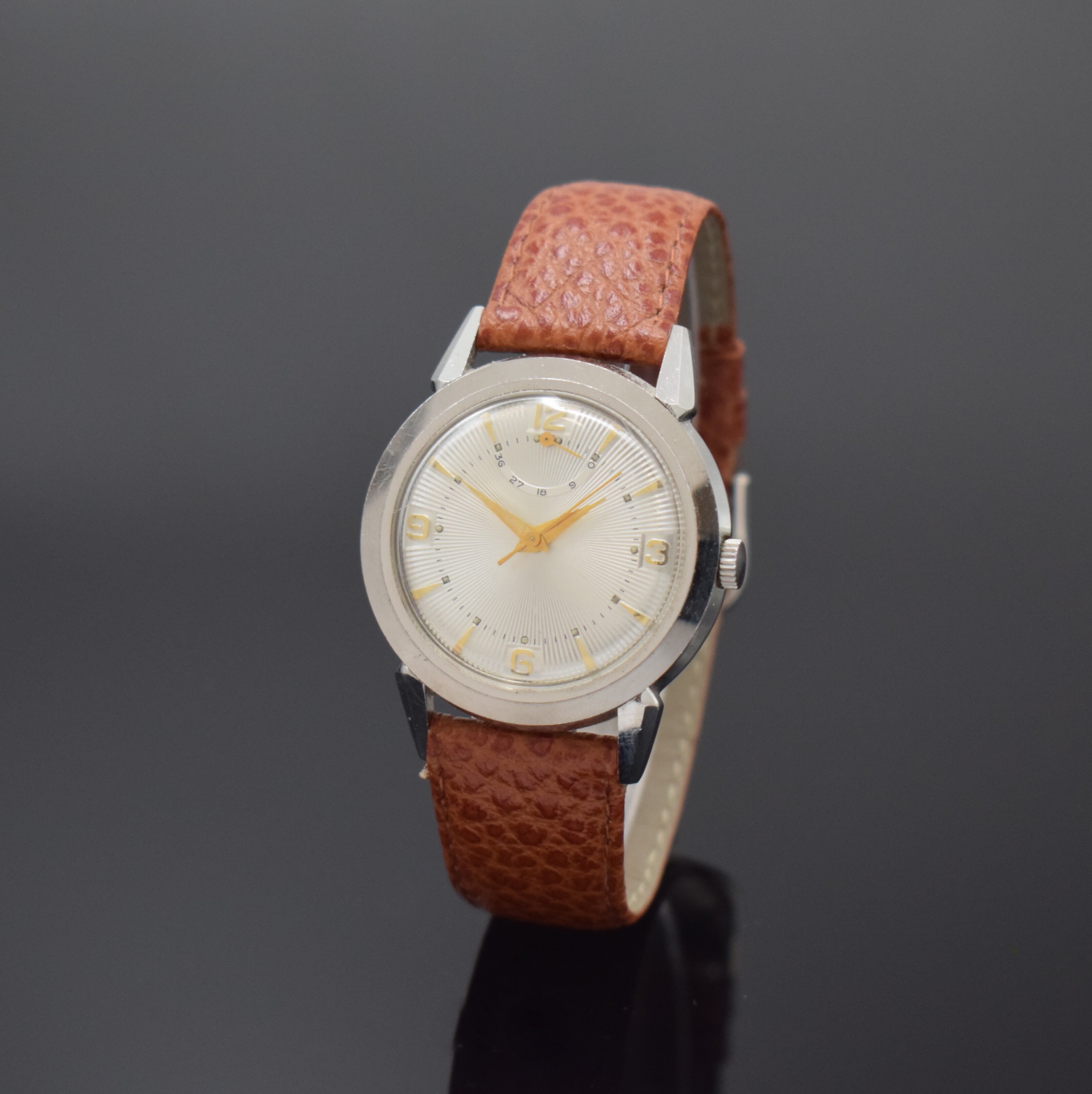 ESKA seltene Herrenarmbanduhr mit Gangreserve, Automatik, Schweiz um 1958, Edelstahl, Boden verschr., silb., streifenguill. Zifferbl., Gangreserve 36 ...