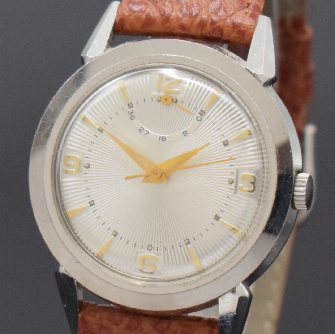 Detail a: ESKA seltene Herrenarmbanduhr mit Gangreserve, Automatik, Schweiz um 1958, Edelstahl, Boden verschr., silb., streifenguill. Zifferbl., Gangreserve 36 ...