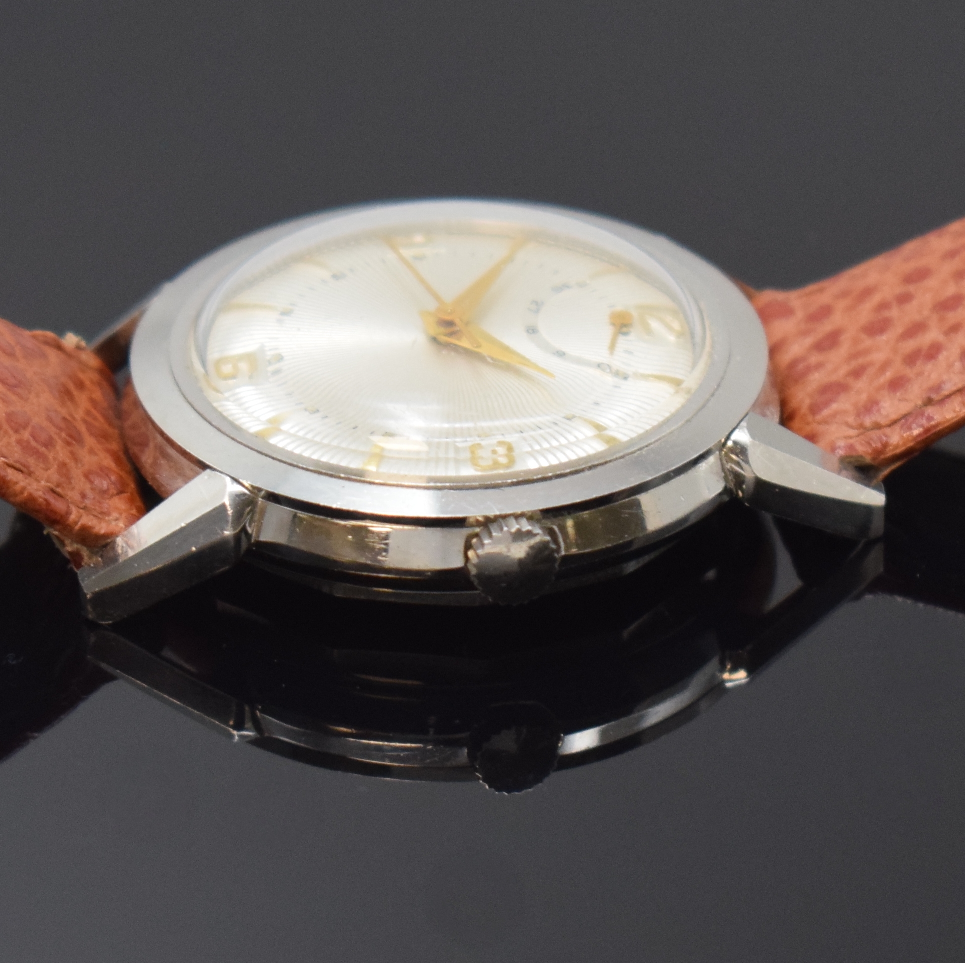 Detail b: ESKA seltene Herrenarmbanduhr mit Gangreserve, Automatik, Schweiz um 1958, Edelstahl, Boden verschr., silb., streifenguill. Zifferbl., Gangreserve 36 ...