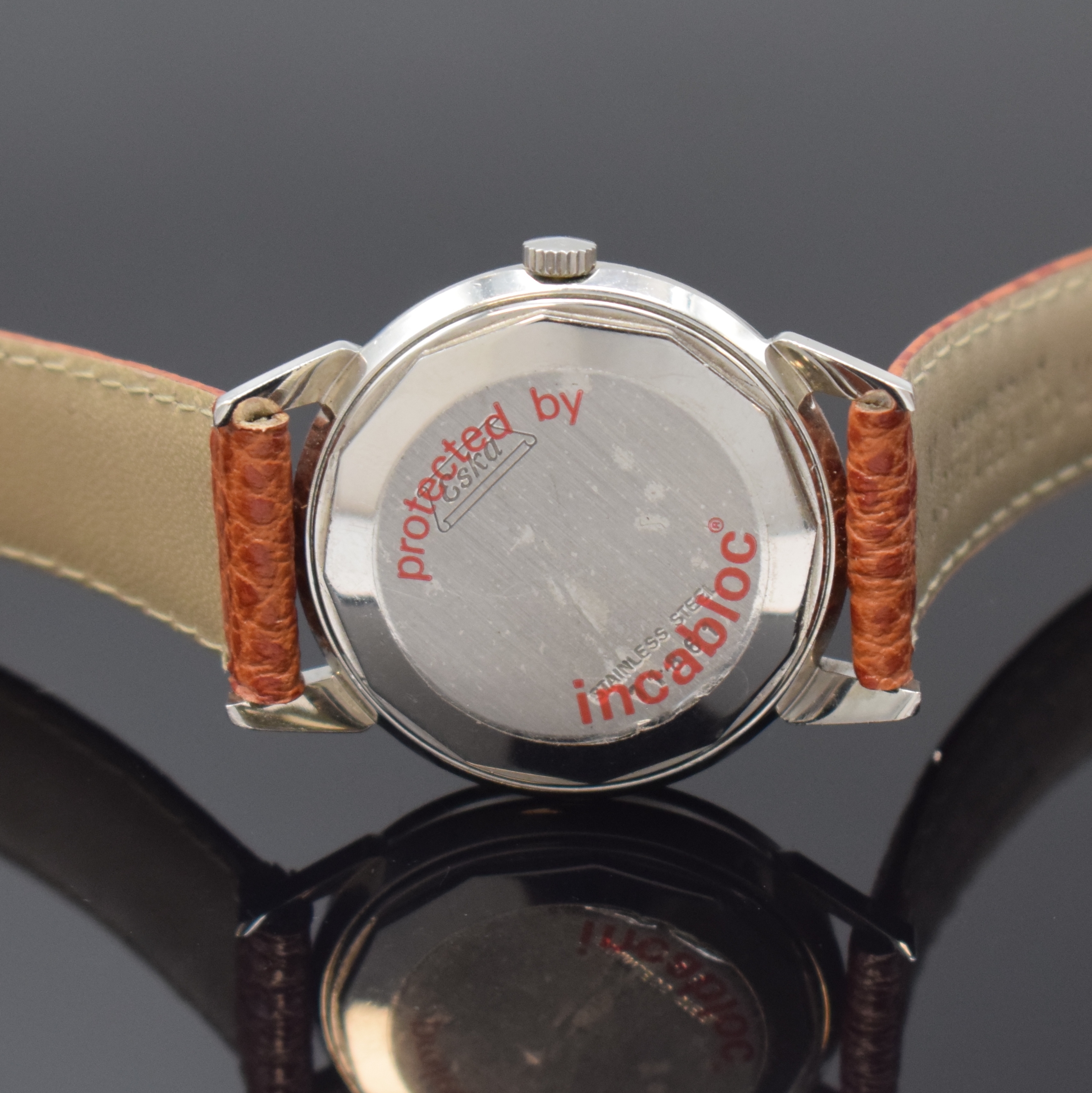 Detail c: ESKA seltene Herrenarmbanduhr mit Gangreserve, Automatik, Schweiz um 1958, Edelstahl, Boden verschr., silb., streifenguill. Zifferbl., Gangreserve 36 ...