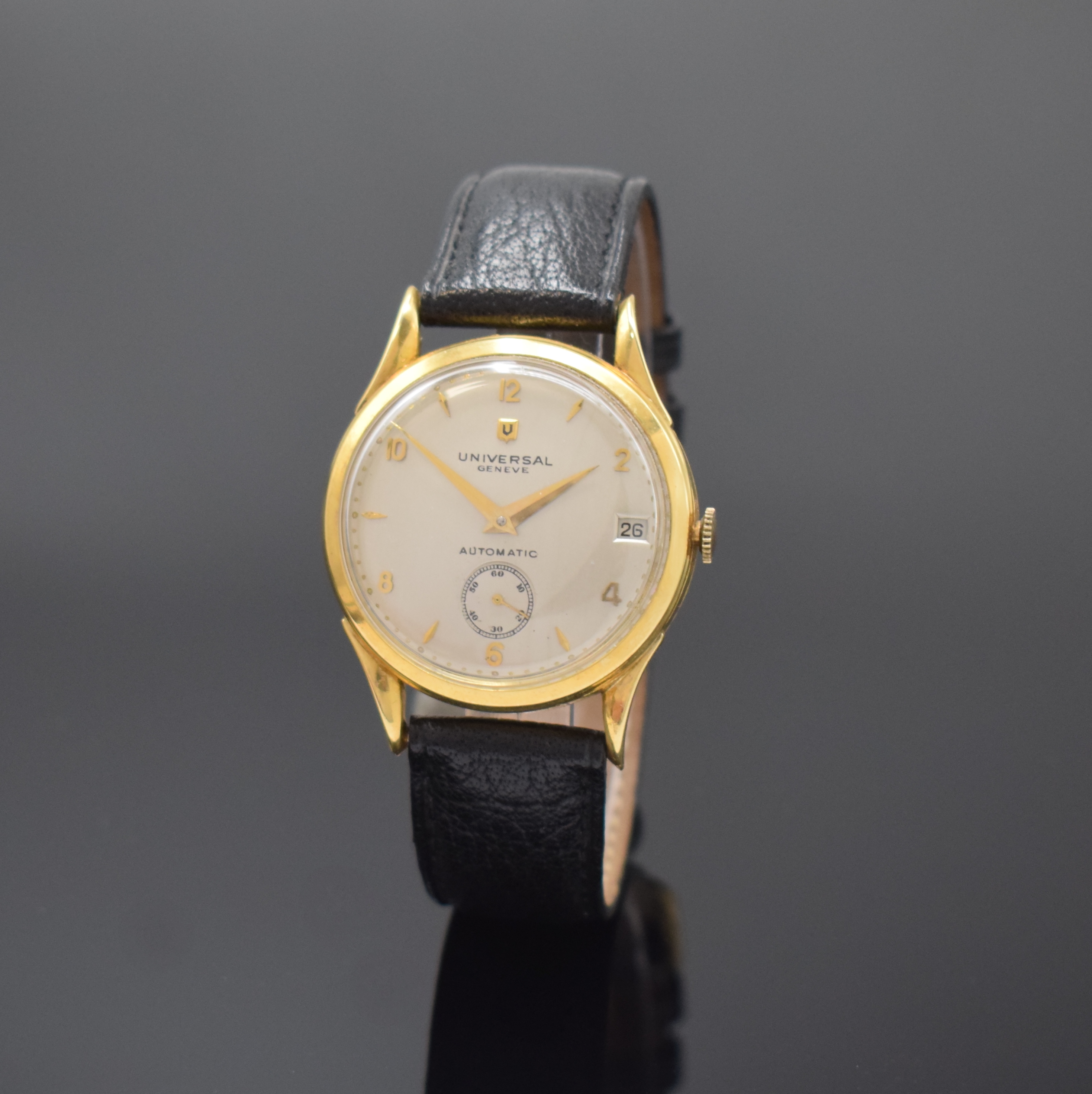 UNIVERSAL GENEVE Herrenarmbanduhr in GG 750/000 mit Hammerautomatik Referenz 100101, Schweiz um 1953, Boden und Glasrand aufgedr., Zifferblatt rest., ...