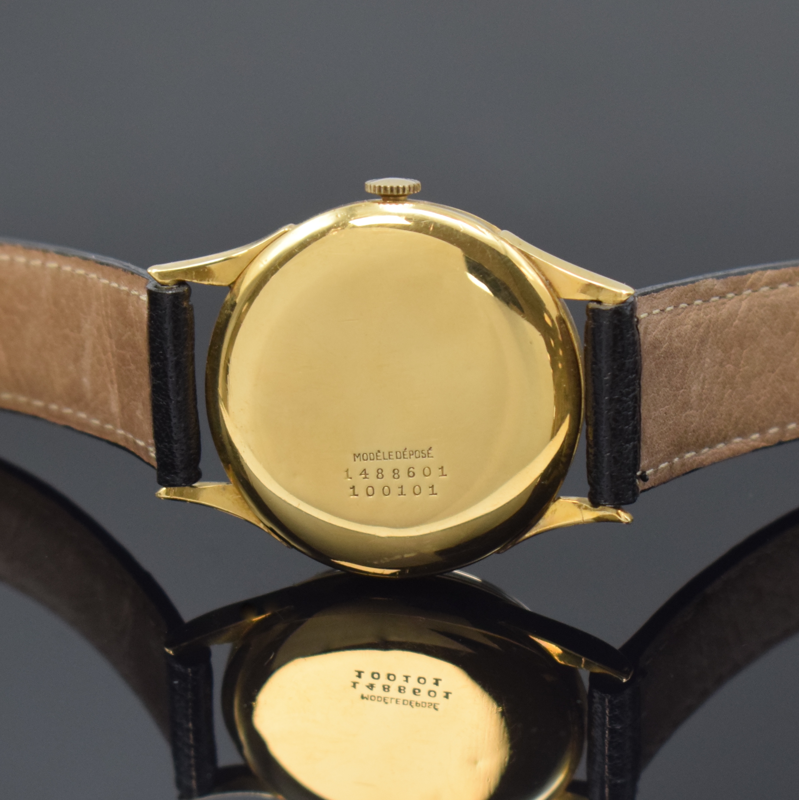 Detail c: UNIVERSAL GENEVE Herrenarmbanduhr in GG 750/000 mit Hammerautomatik Referenz 100101, Schweiz um 1953, Boden und Glasrand aufgedr., Zifferblatt rest., ...