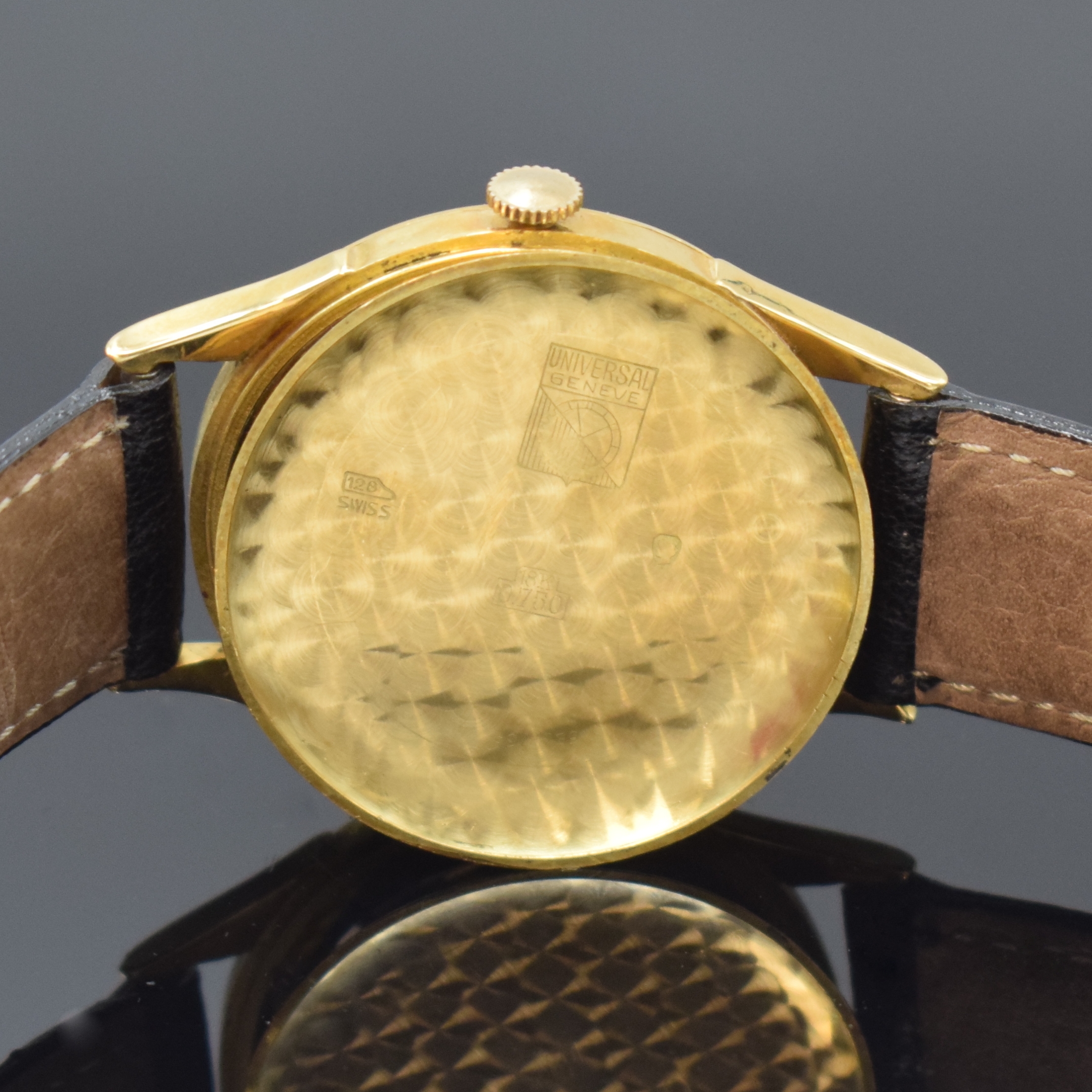 Detail f: UNIVERSAL GENEVE Herrenarmbanduhr in GG 750/000 mit Hammerautomatik Referenz 100101, Schweiz um 1953, Boden und Glasrand aufgedr., Zifferblatt rest., ...