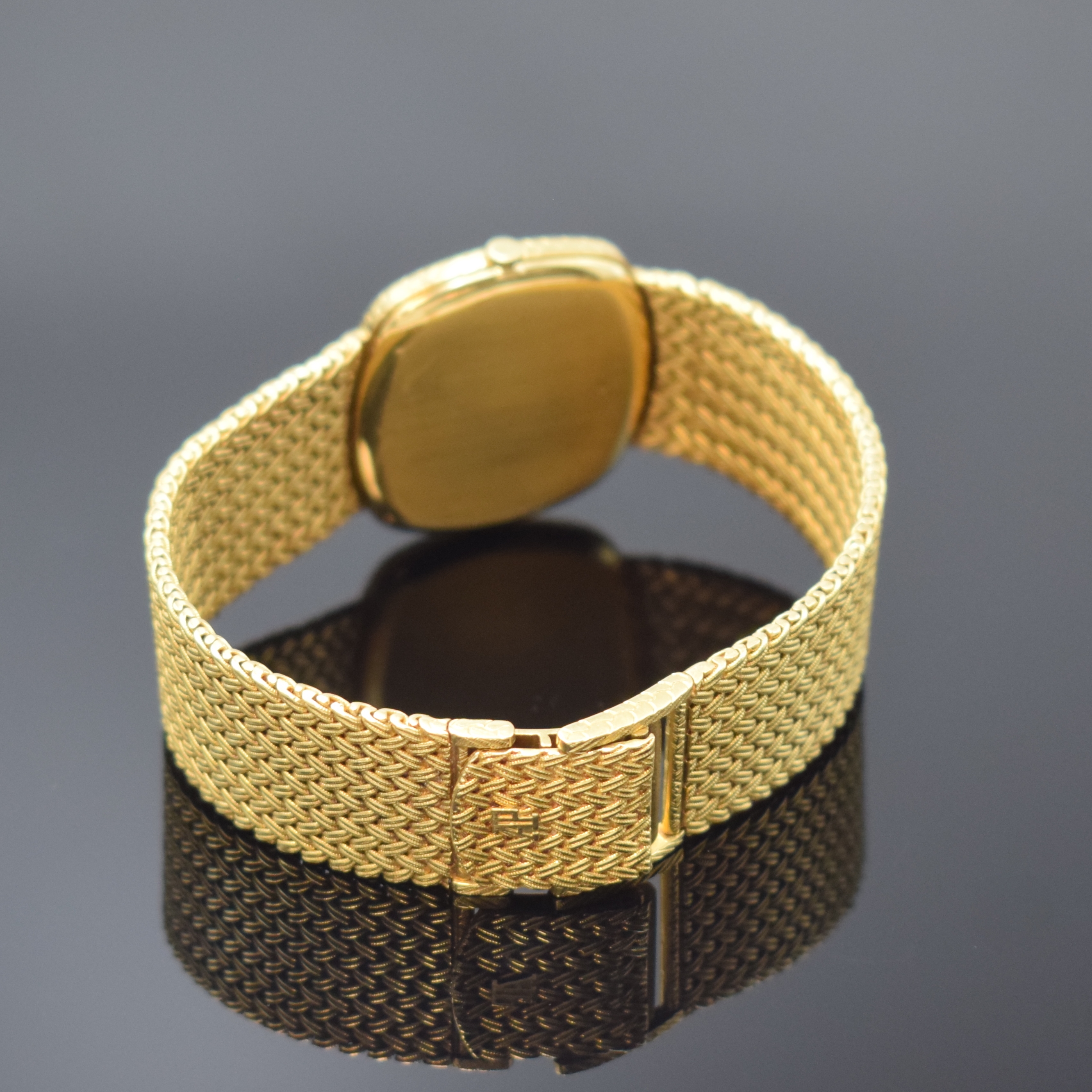 Detail b: AUDEMARS PIGUET feine Herrenarmbanduhr in GG 750/000, Automatik, Schweiz um 1975, 2-teil. Geh., Boden aufgedr., Flechtband, verg. Zifferbl. m. ...