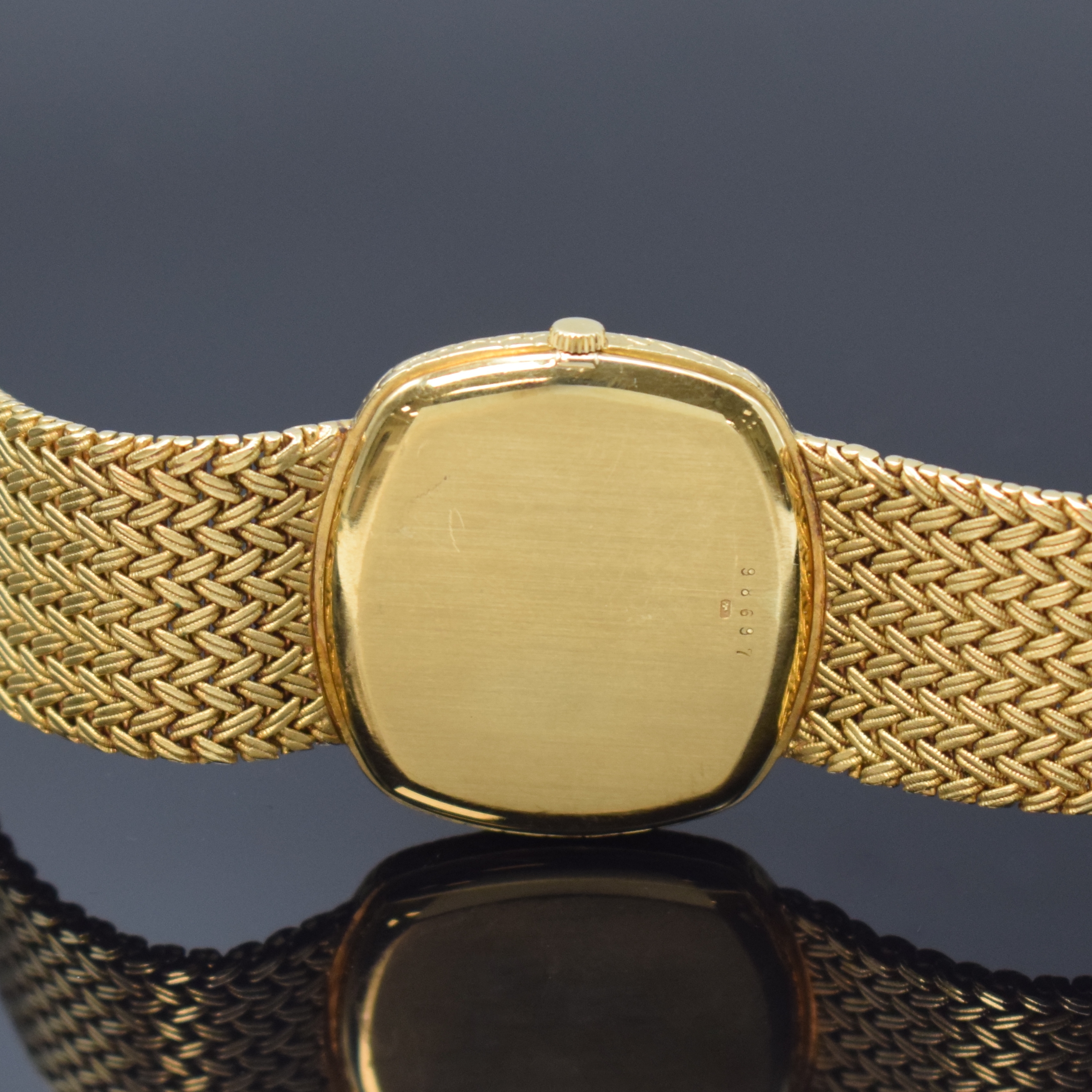 Detail e: AUDEMARS PIGUET feine Herrenarmbanduhr in GG 750/000, Automatik, Schweiz um 1975, 2-teil. Geh., Boden aufgedr., Flechtband, verg. Zifferbl. m. ...