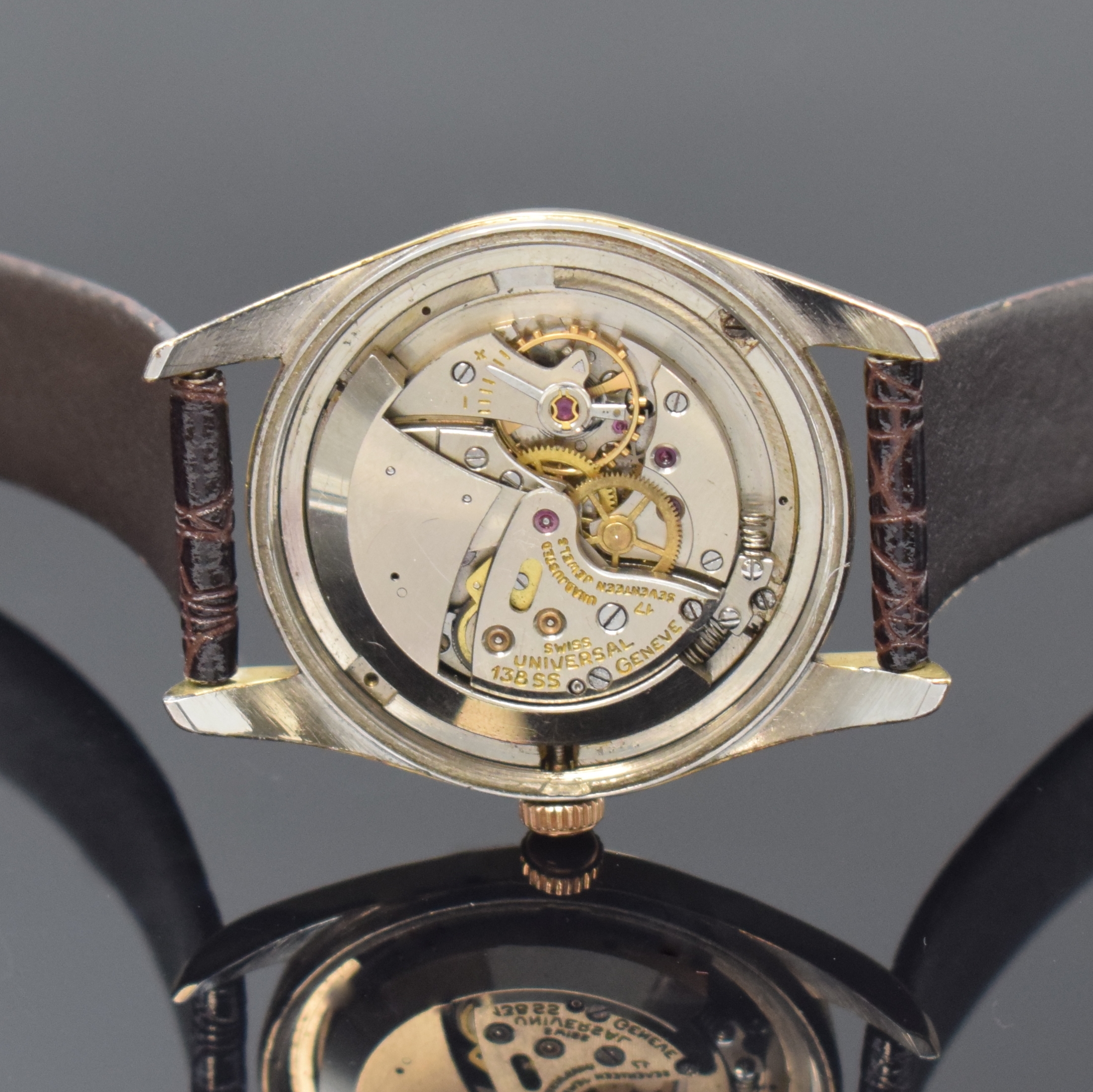 Detail e: UNIVERSAL GENEVE Herrenarmbanduhr Polerouter mit Hammerautomatik, Schweiz um 1950, Edelstahlgeh. mit Goldhaube, schwarzes shiny Dial mit Fadenkreuz ...