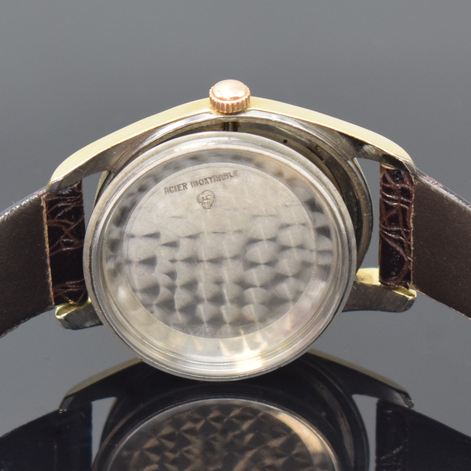Detail f: UNIVERSAL GENEVE Herrenarmbanduhr Polerouter mit Hammerautomatik, Schweiz um 1950, Edelstahlgeh. mit Goldhaube, schwarzes shiny Dial mit Fadenkreuz ...