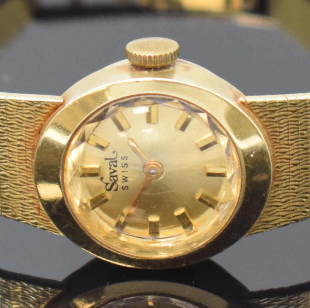 Detail a: SAVAL Damenarmbanduhr in GG 585/000, Schweiz um 1965, Handaufzug, Goldband, Boden aufgedr., goldfarb. Zifferbl. m. aufges. Std.-Ind., gold. Zeiger, ...