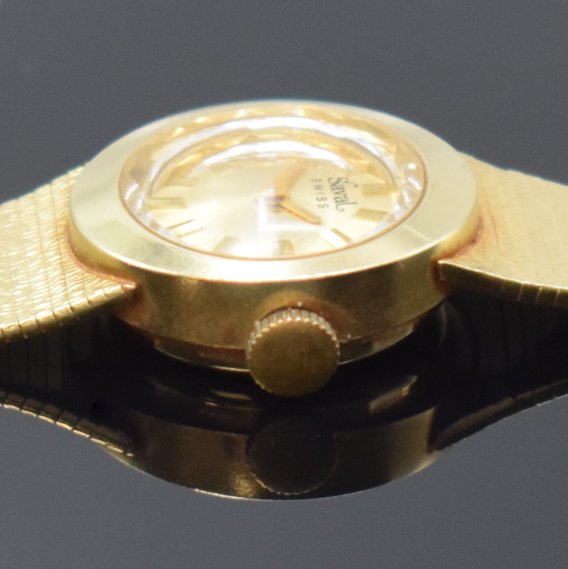 Detail c: SAVAL Damenarmbanduhr in GG 585/000, Schweiz um 1965, Handaufzug, Goldband, Boden aufgedr., goldfarb. Zifferbl. m. aufges. Std.-Ind., gold. Zeiger, ...