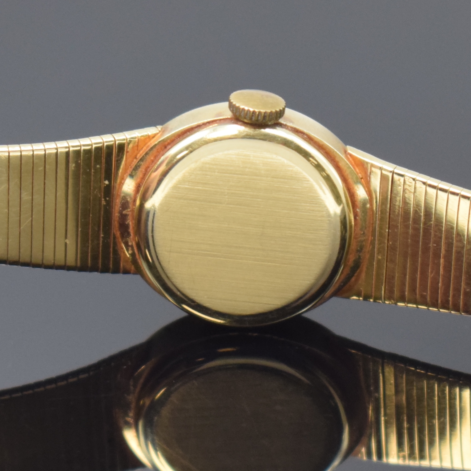 Detail d: SAVAL Damenarmbanduhr in GG 585/000, Schweiz um 1965, Handaufzug, Goldband, Boden aufgedr., goldfarb. Zifferbl. m. aufges. Std.-Ind., gold. Zeiger, ...
