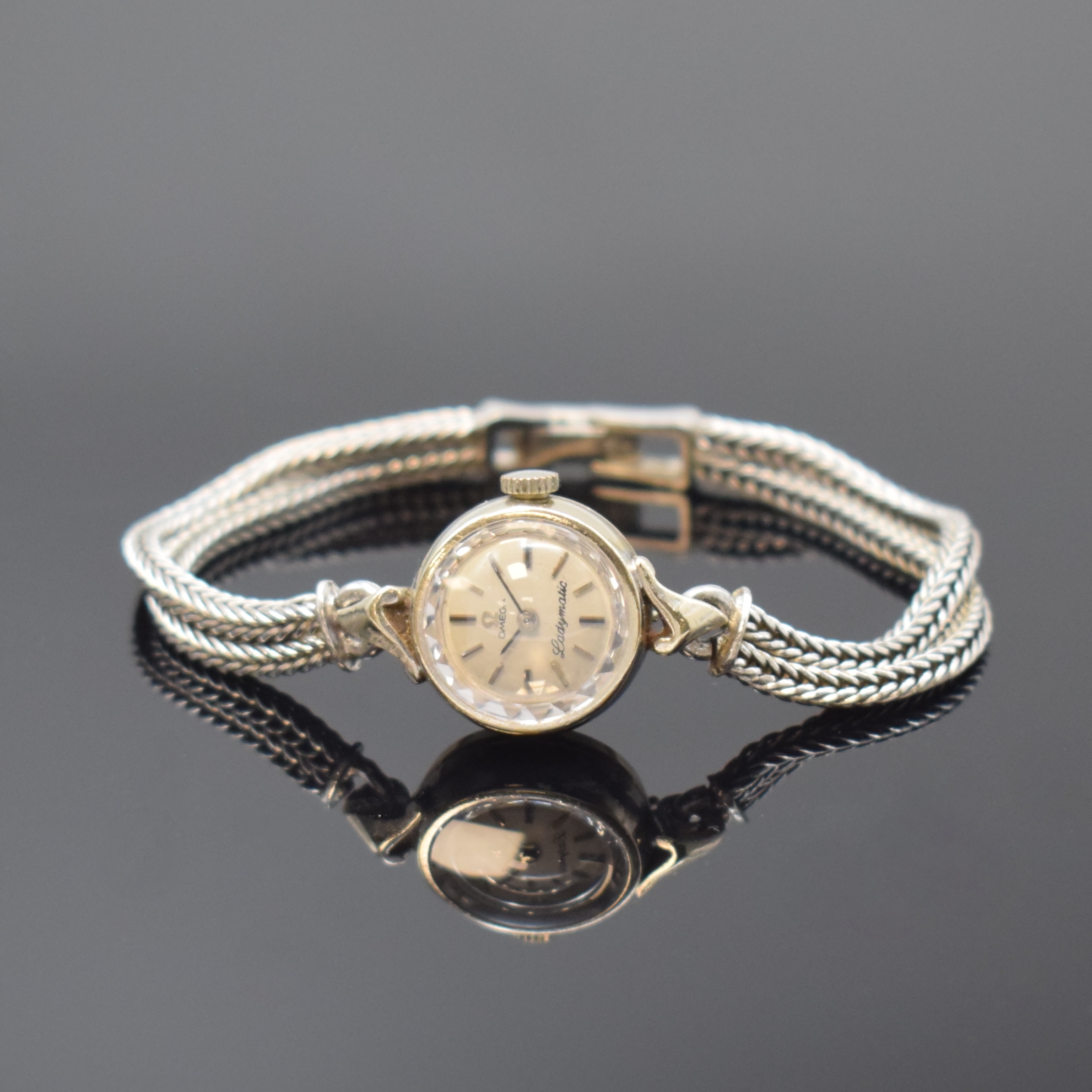 OMEGA Ladymatic Damenarmbanduhr in WG 585/000, Schweiz für d. US-Markt um 1964, WG 585/000 Band sekundär, Boden aufgedr., eine der kleinsten ...
