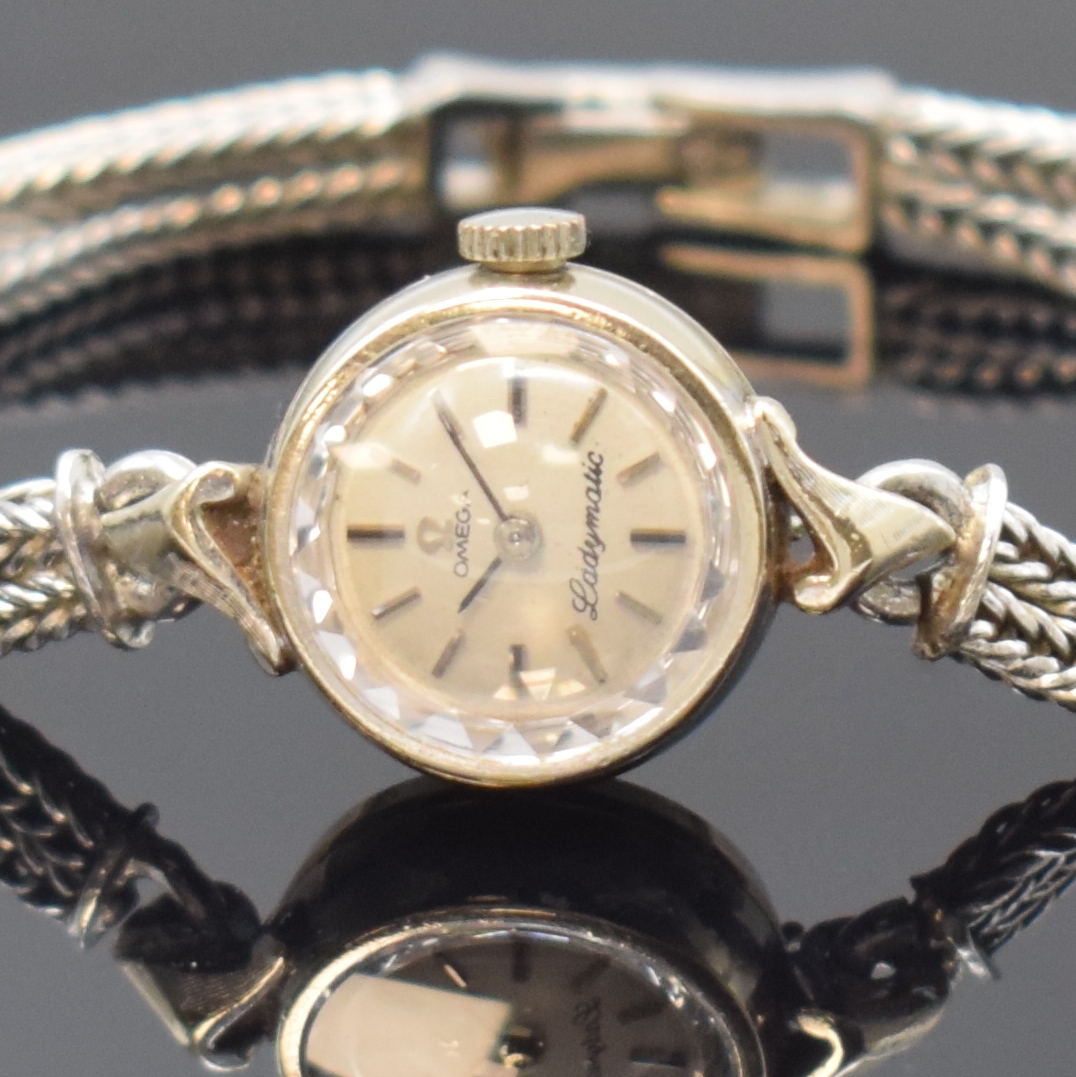 Detail a: OMEGA Ladymatic Damenarmbanduhr in WG 585/000, Schweiz für d. US-Markt um 1964, WG 585/000 Band sekundär, Boden aufgedr., eine der kleinsten ...