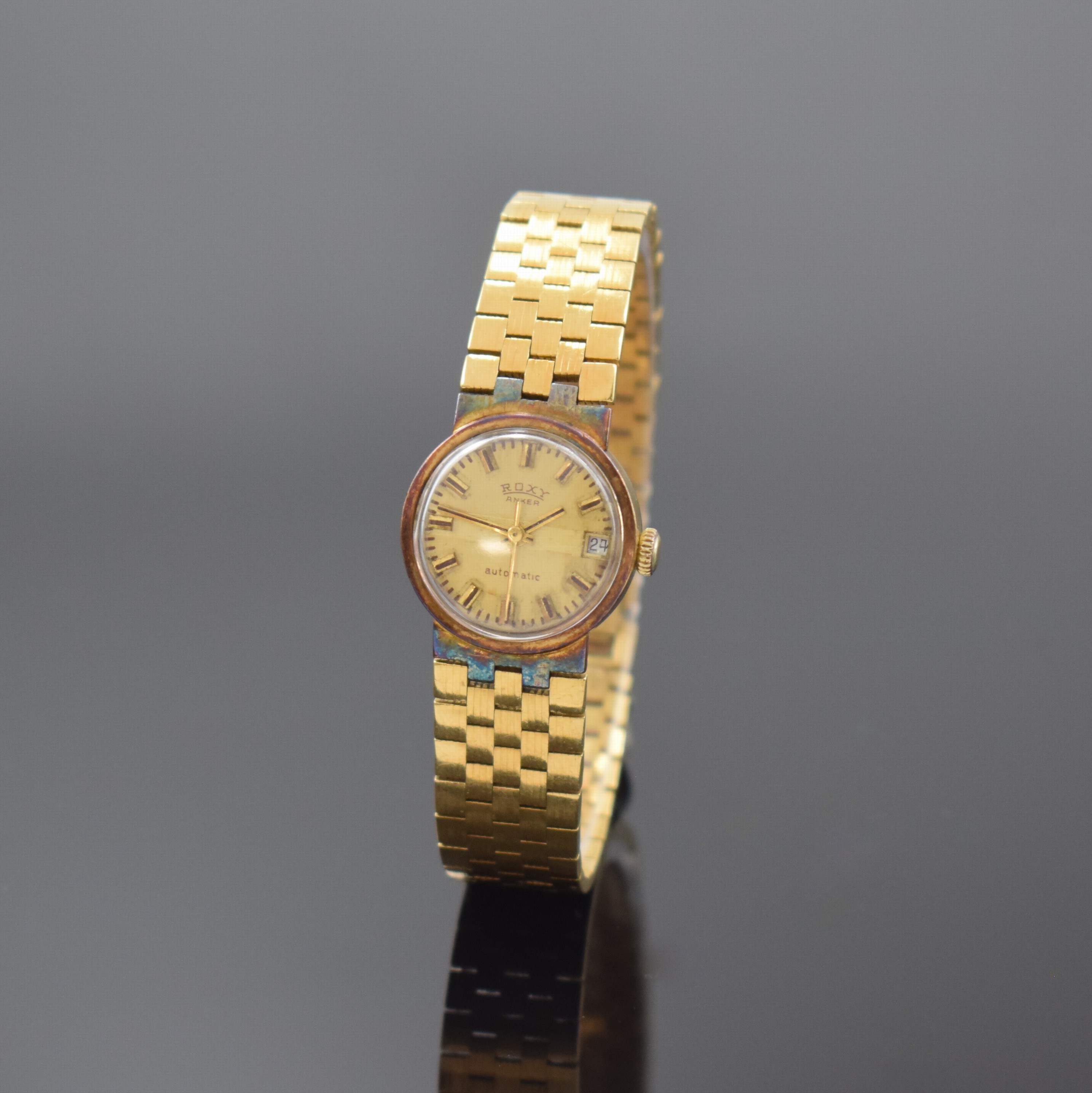 ROXY Damenarmbanduhr in GG 750/000, Schweiz um 1970, Automatik, 2-teil. Geh. inkl. Gliederband, Boden aufgedr., gold. Zifferbl. m. aufgel. Indizes ...