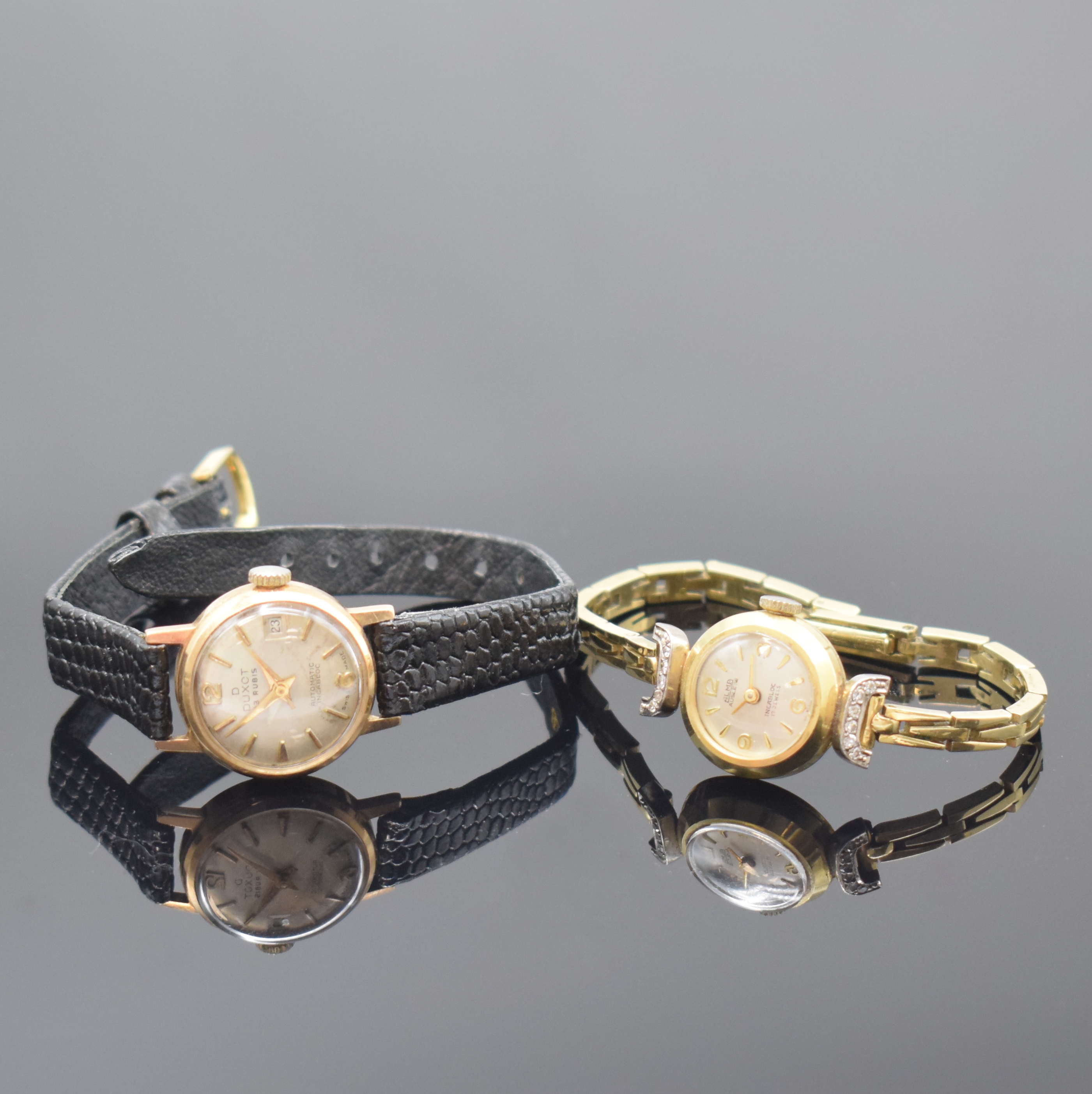 Konvolut 2 Damenarmbanduhr in GG und RG 585/000, Schweiz um 1960, 1 x ALMA, Handaufzug, Boden aufgedr., inkl. Gliederband, Bandanst. m. Diamanten ...