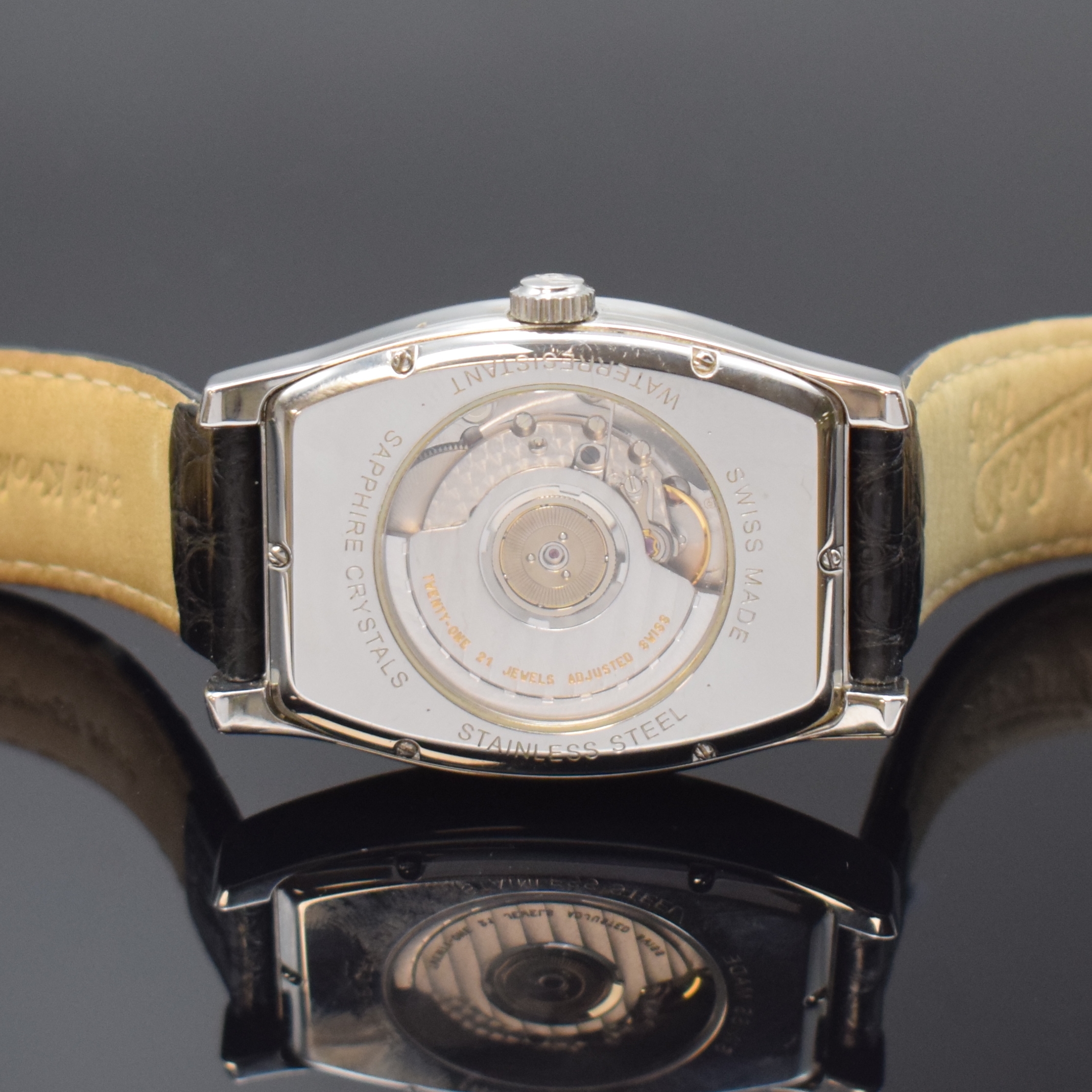 Detail d: DUBOIS Armbanduhr mit 2. Zeitzone in Stahl, Schweiz um 2000, Automatik, beids. vergl. tonneauförm. Geh., Boden 6-fach verschr., silb. Zifferbl. im ...