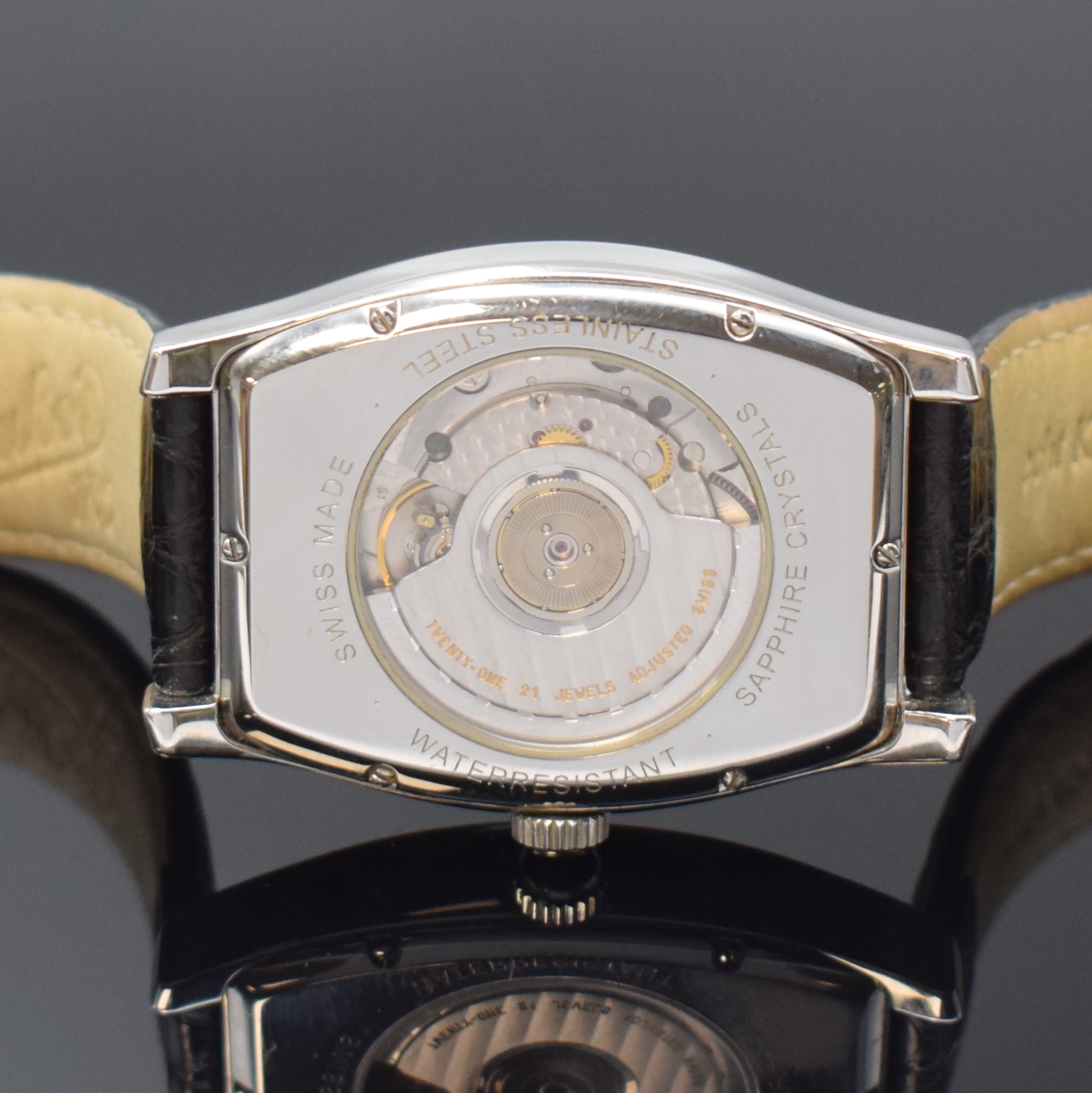 Detail e: DUBOIS Armbanduhr mit 2. Zeitzone in Stahl, Schweiz um 2000, Automatik, beids. vergl. tonneauförm. Geh., Boden 6-fach verschr., silb. Zifferbl. im ...