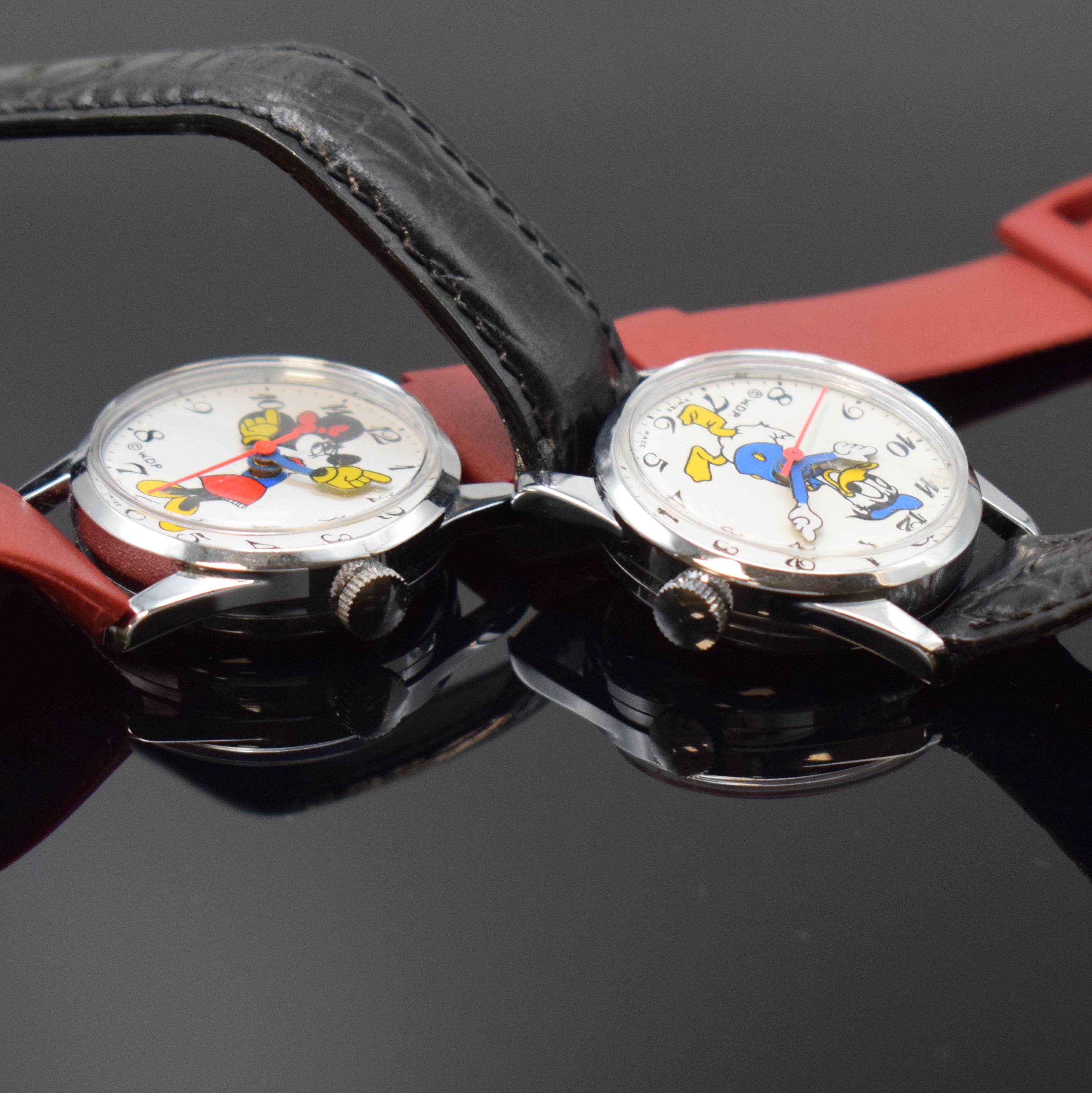 Detail f: WALT DISNEY 4 Comicuhren, Schweiz ca. 1960er-1970er Jahre, Handaufzug, verchr. Geh., Böden aufgedr., 1 x "Donald", 1 x "Pluto", ...