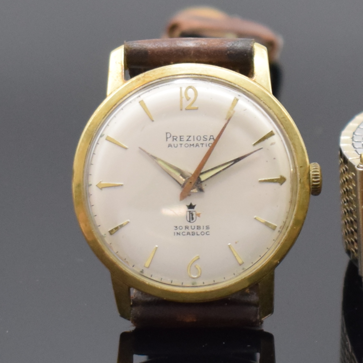Detail a: Konvolut 2 Armbanduhren in GG 585/000 Schweiz um 1970, Automatik/Handaufzug, 2-tlg. Geh., Böden aufgedr., 1) TISSOT, Widmungsgrav. auf Boden, gold. ...